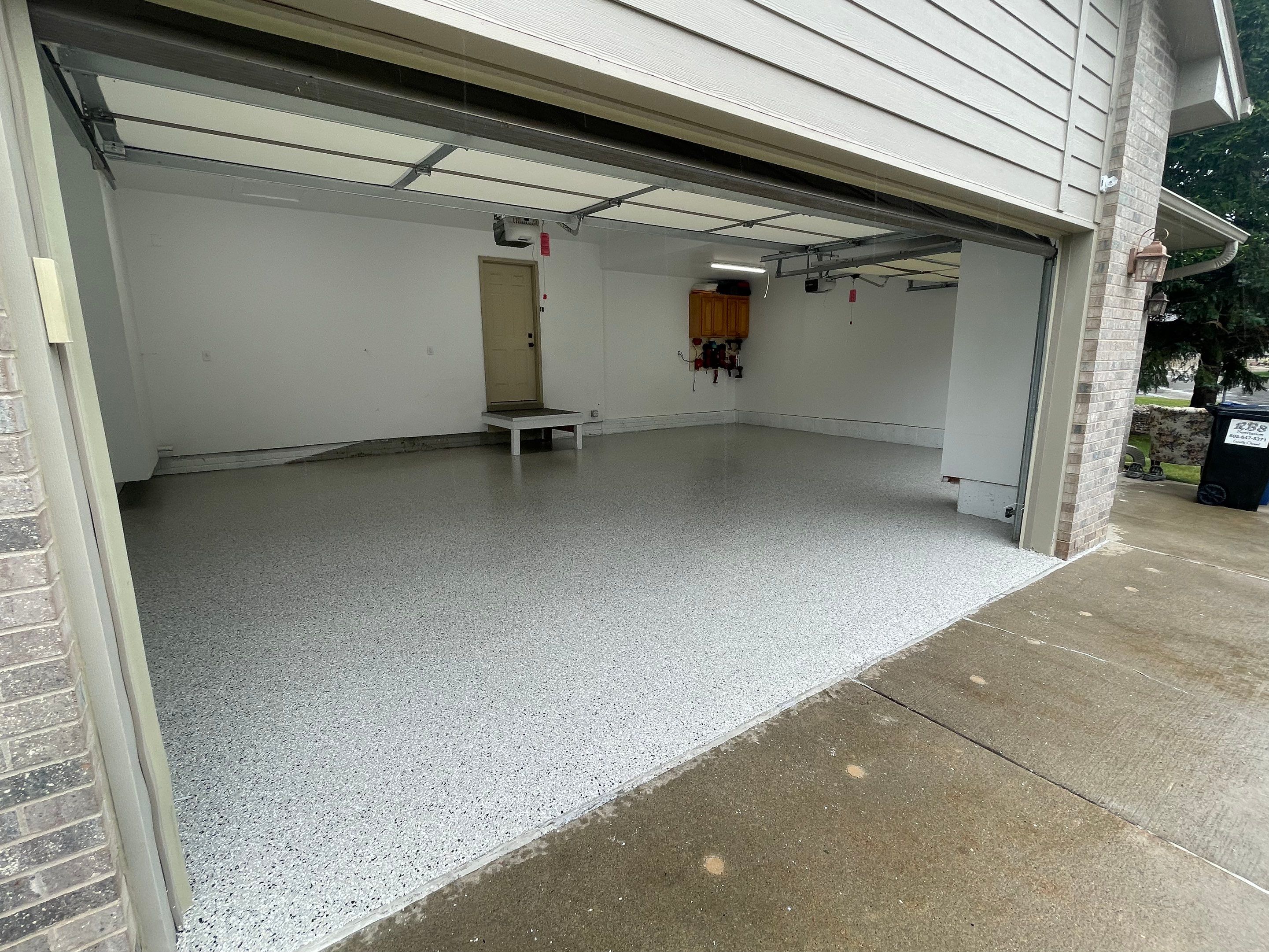Cabin Fever Garage Floor System in Sioux Falls by Select Painting, Coatings & Garage Cabinets