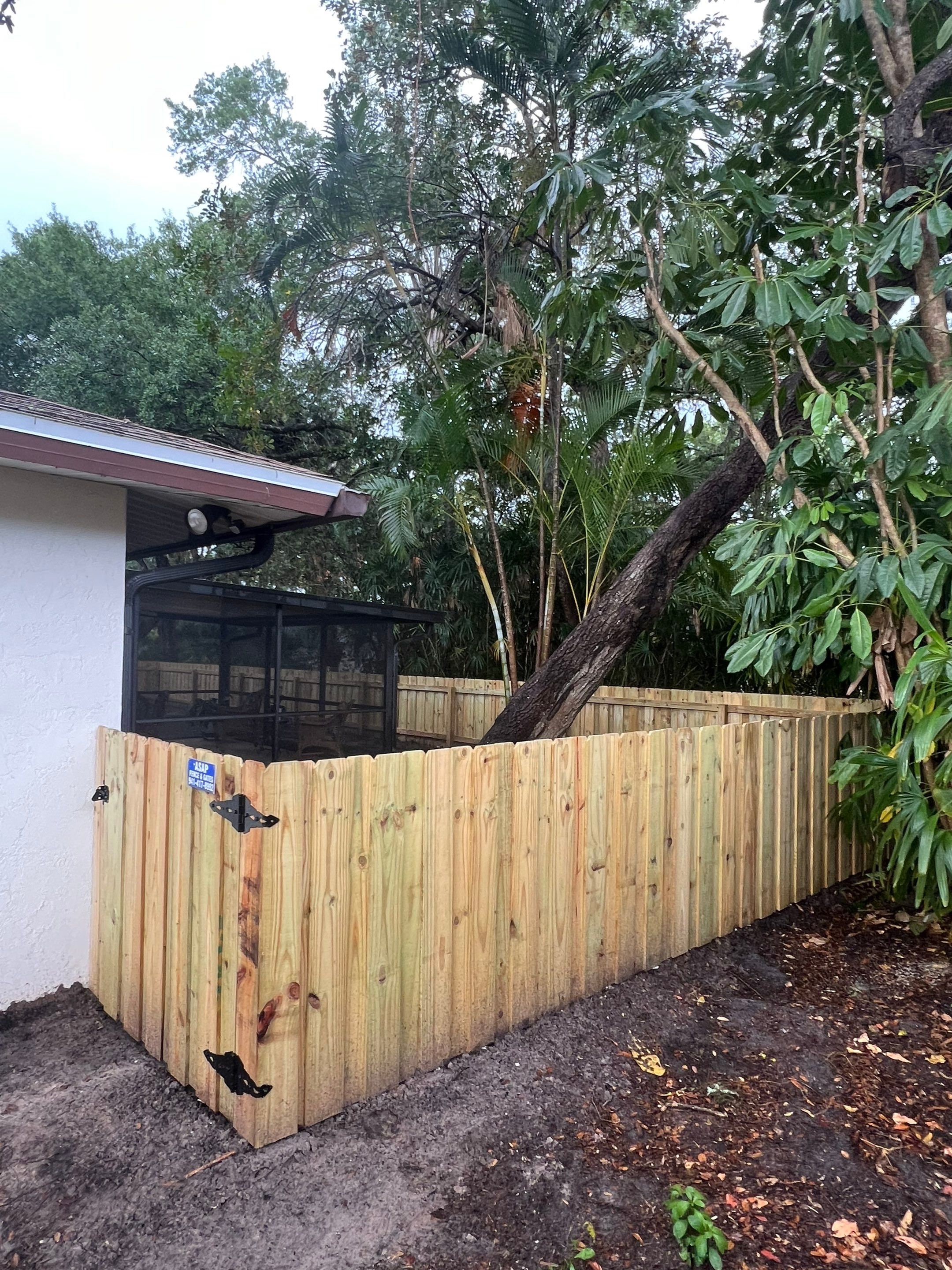 Sarasota, FL 4ft. Tall Treated Board on Board Fence by Asap fence and gates, LLC