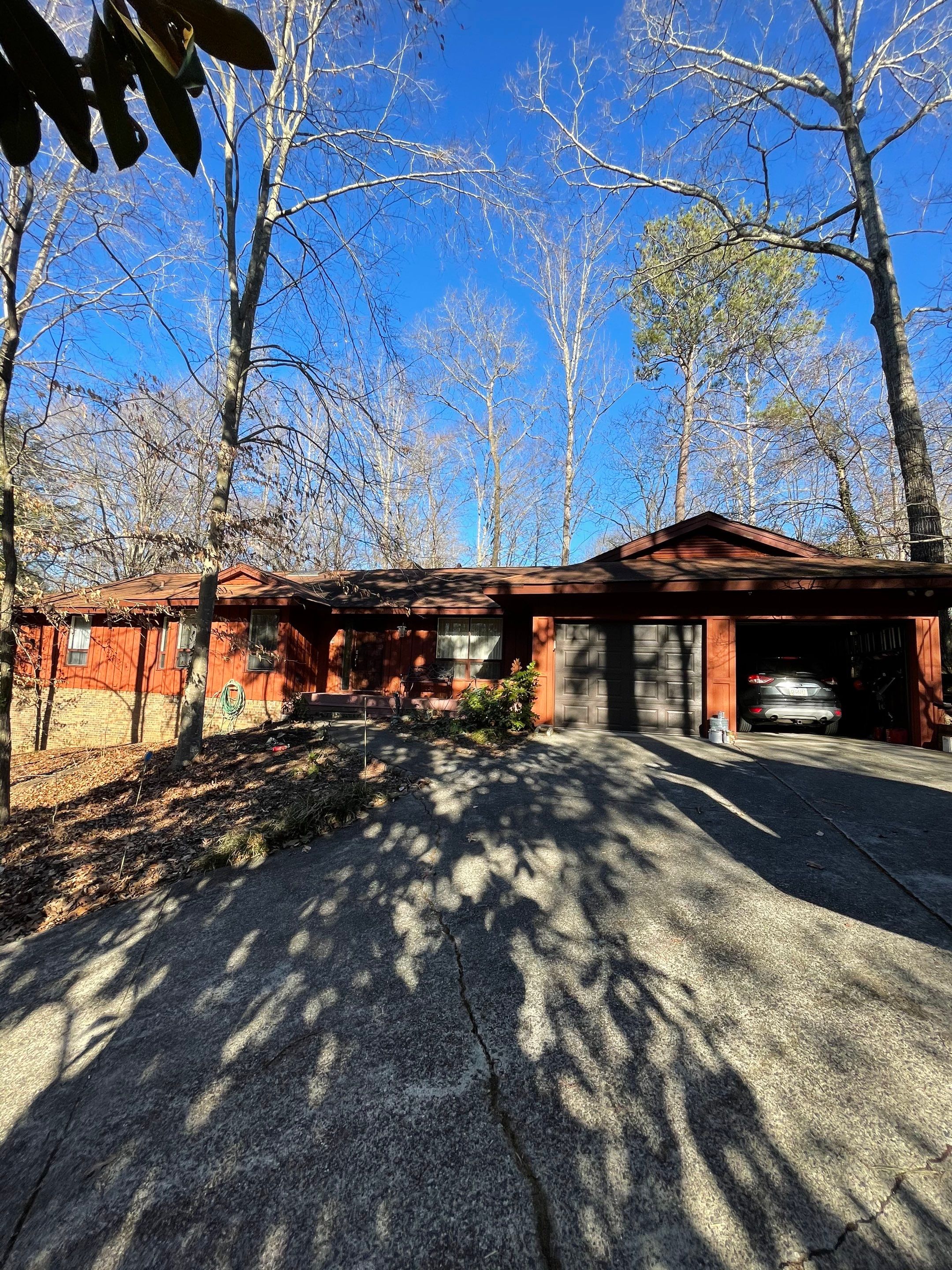 Exterior Wood Siding Painting and Gutter Refurbishment in Roswell by Swift Home Renovations