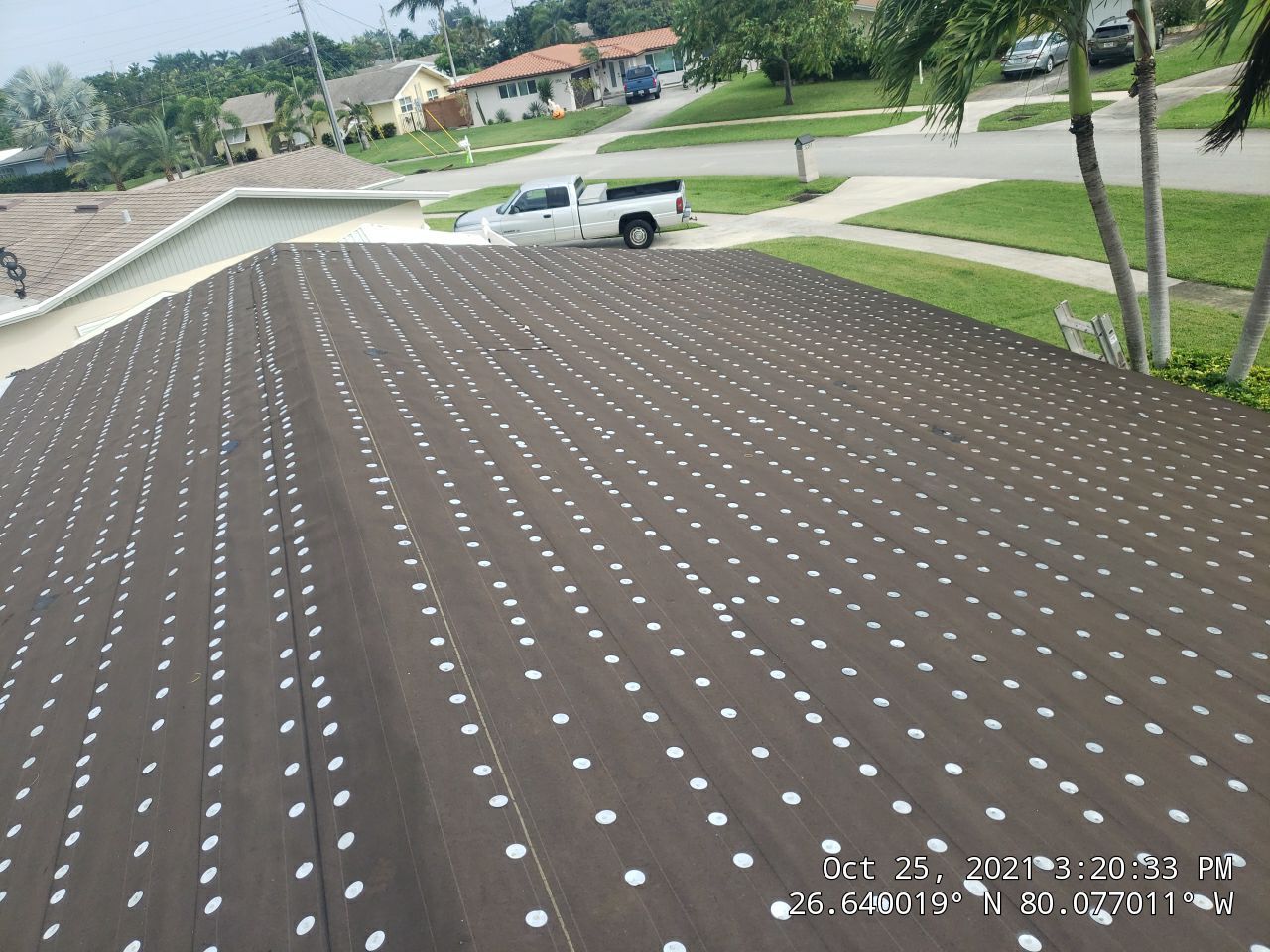 Residential Roofing Installation using 1" Nail strip metal roof by BLUES BROTHERS CONSTRUCTION CORP