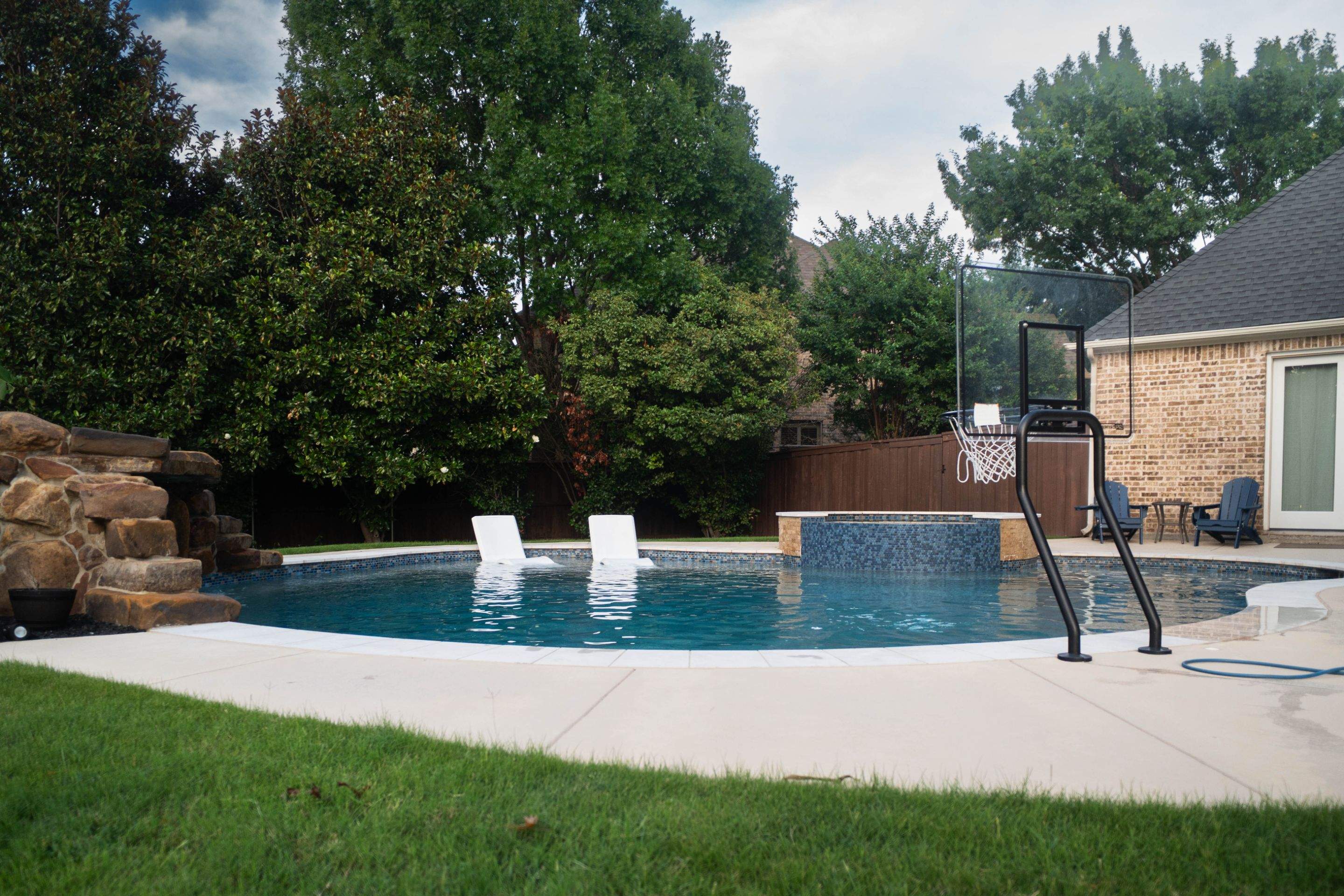 Large Freeform Resort-Style Pool by Pinnacle Pools and Spas - DFW