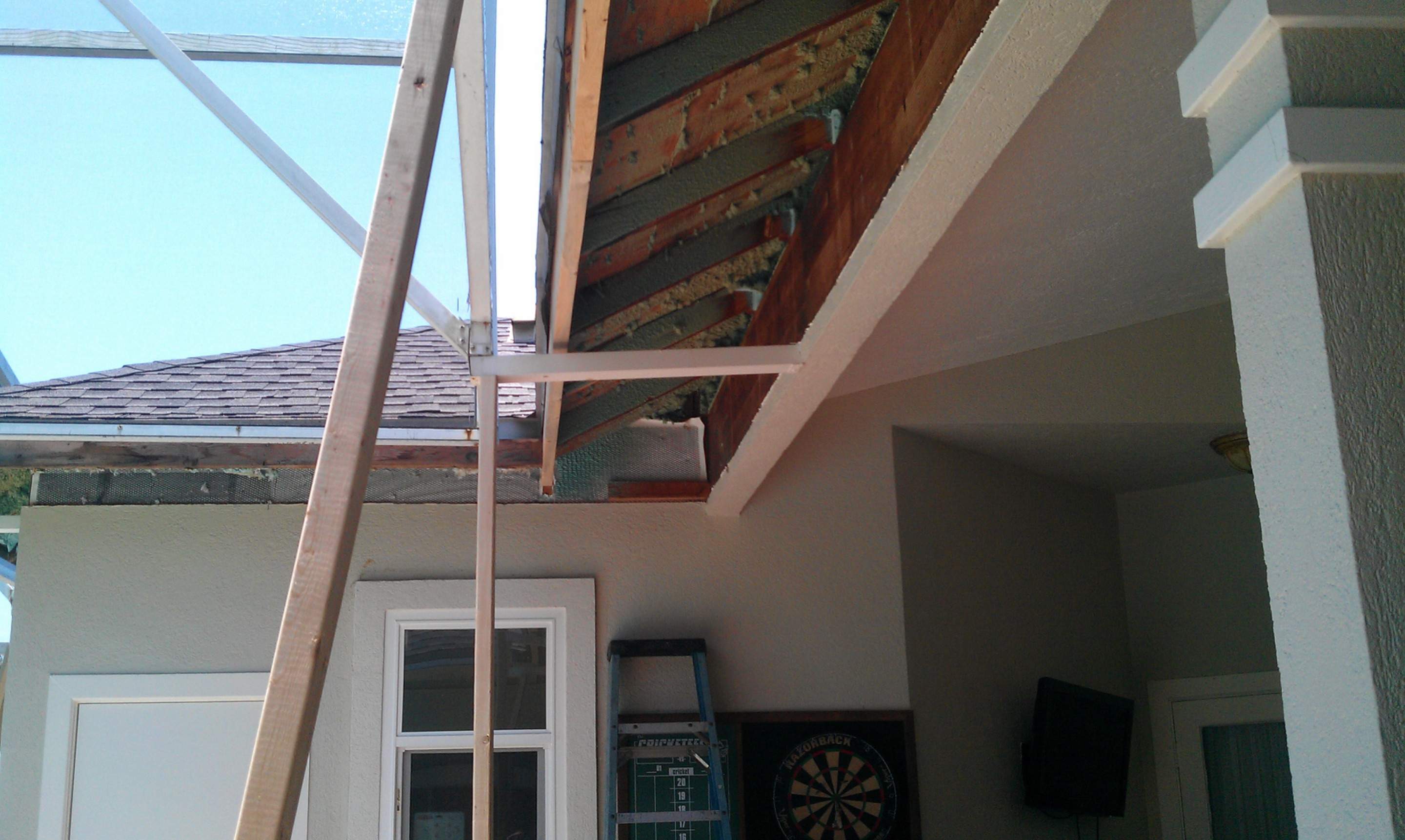 Rotten Wood Fascia Replacement for Malabar Screened Patio by Florida Roofing and Renovations Inc.