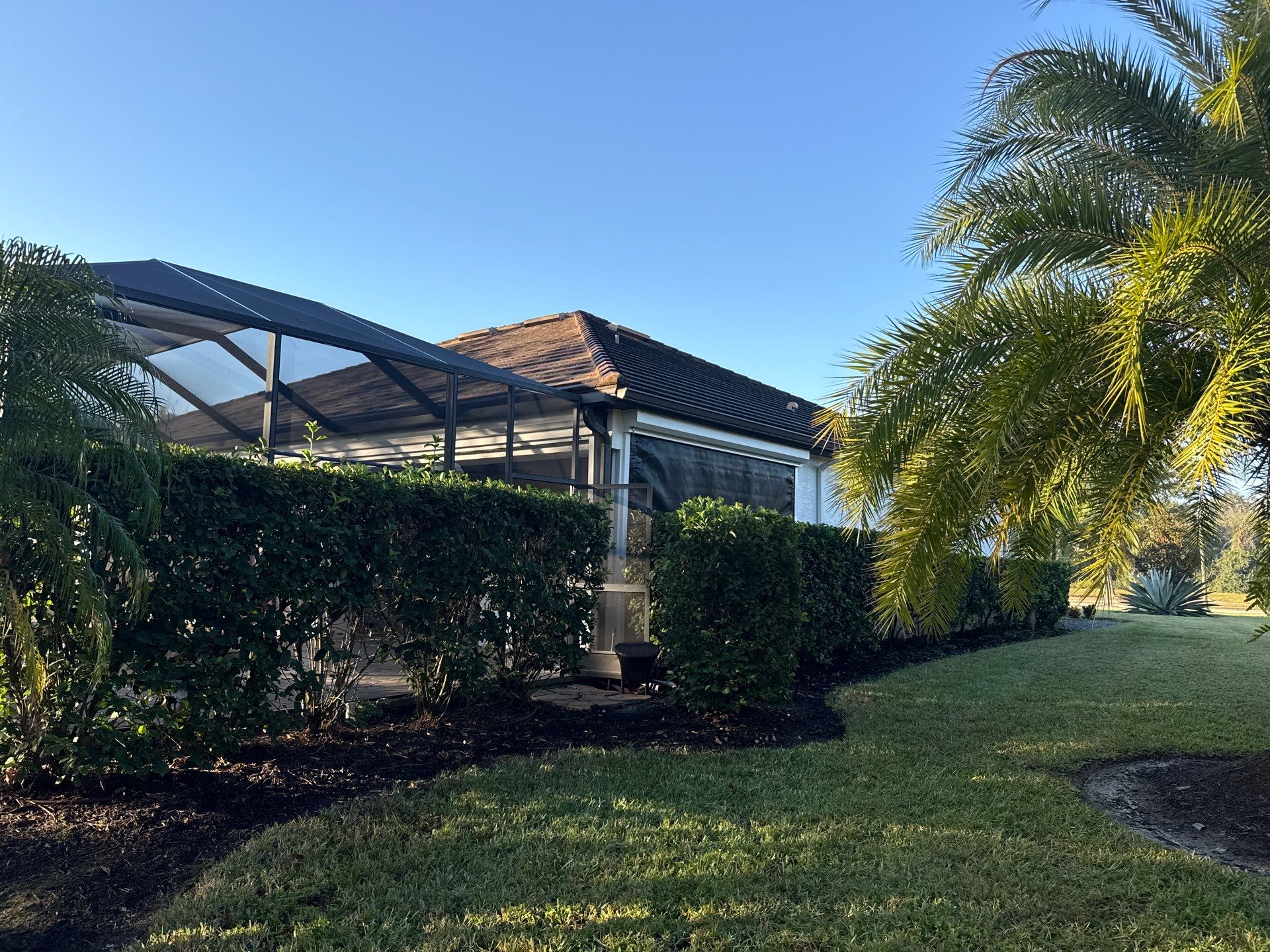 Flat Tile Roof, Paver Pool Deck & Driveway Cleaning | Cove at Twin Rivers, Parrish FL by Sunshine AquaWash