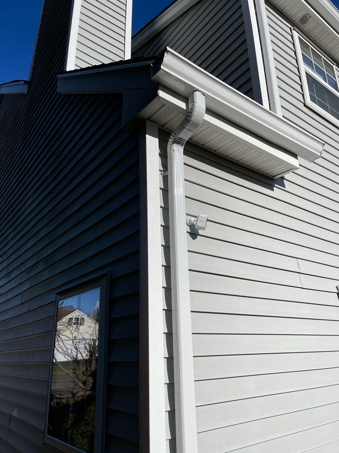 Gutter Installation using White gutters by A Plus Exterior