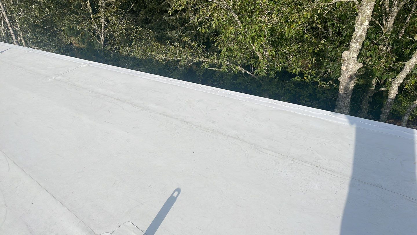 Commercial Roofing Installation using GAF 60Mil TPO  by Orezona Building & Roofing Company, Inc.