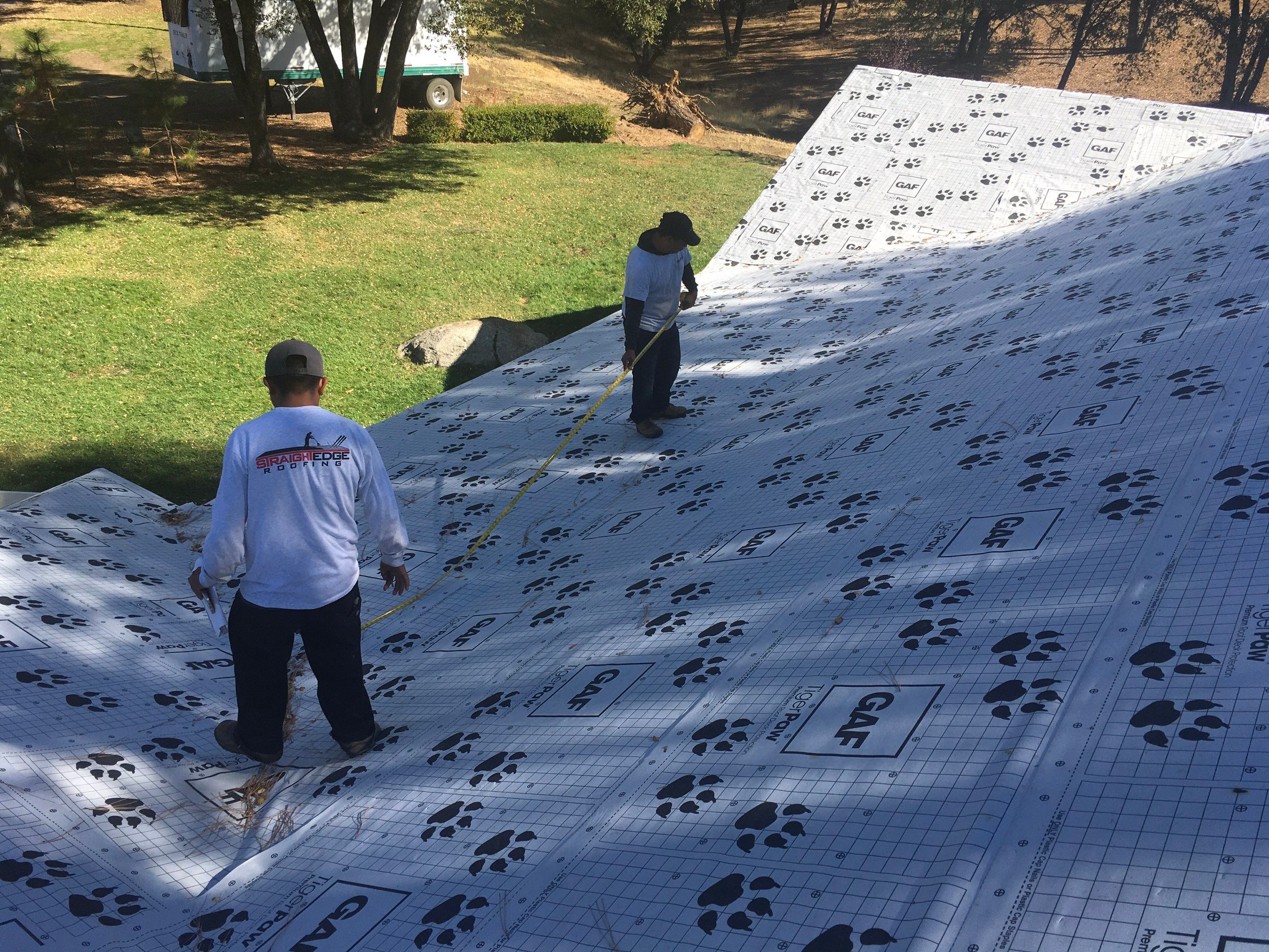 Metal roofing installation using Standing seam metal roofing system by Straight Edge Roofing Inc