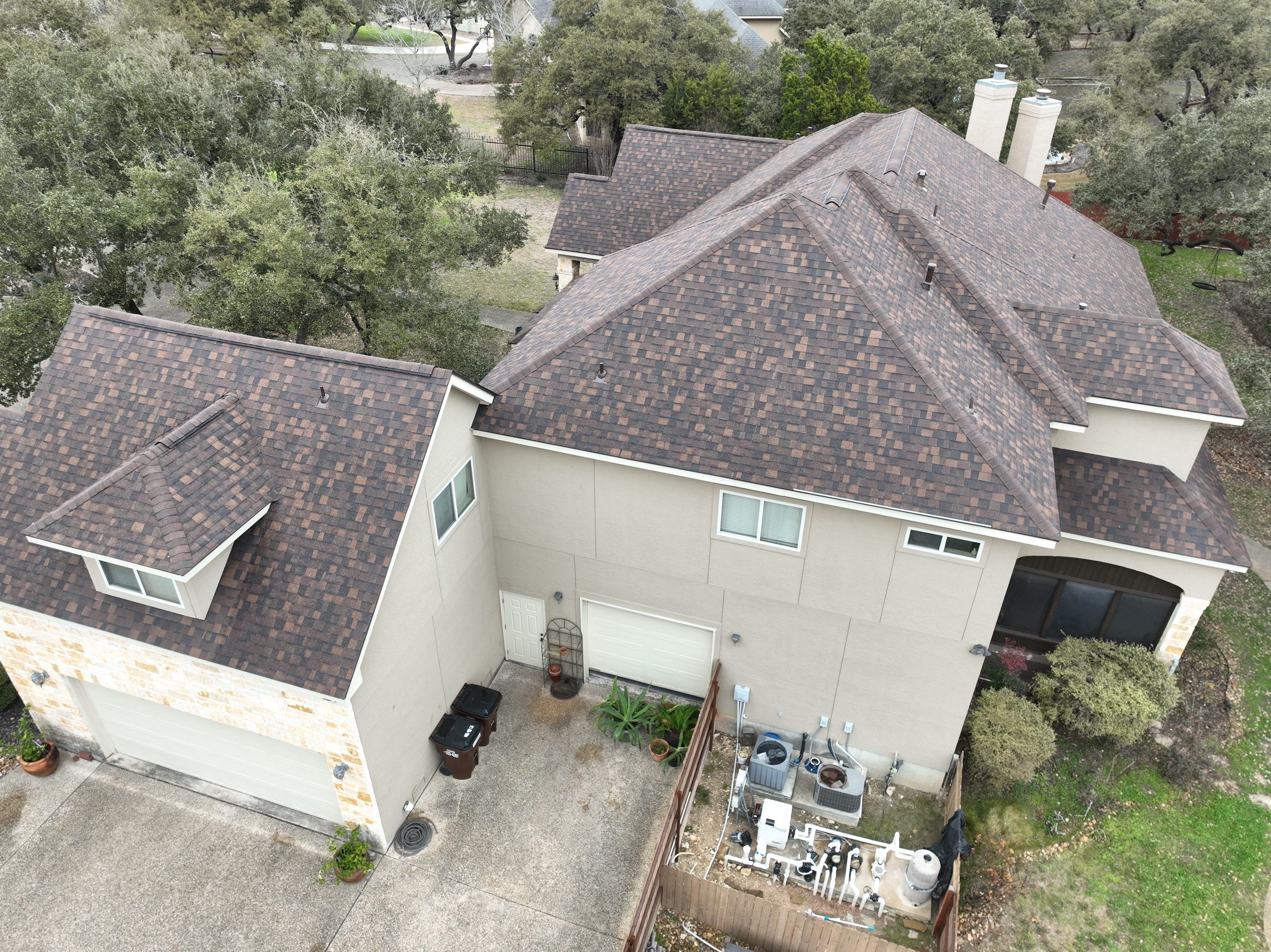 Residential Roof Replacement using 30 Year Laminate Shingles with High Profile Ridge by Premier Roofing and Contracting