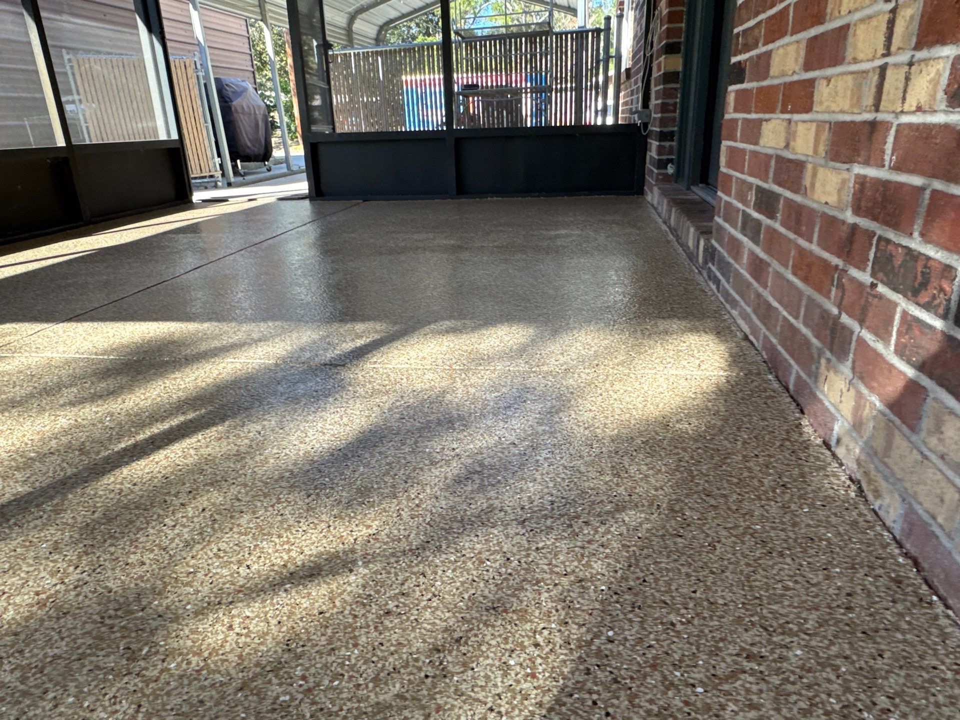 Porch in Gainesville, FL in Pecan by Cross Creek Concrete Coatings