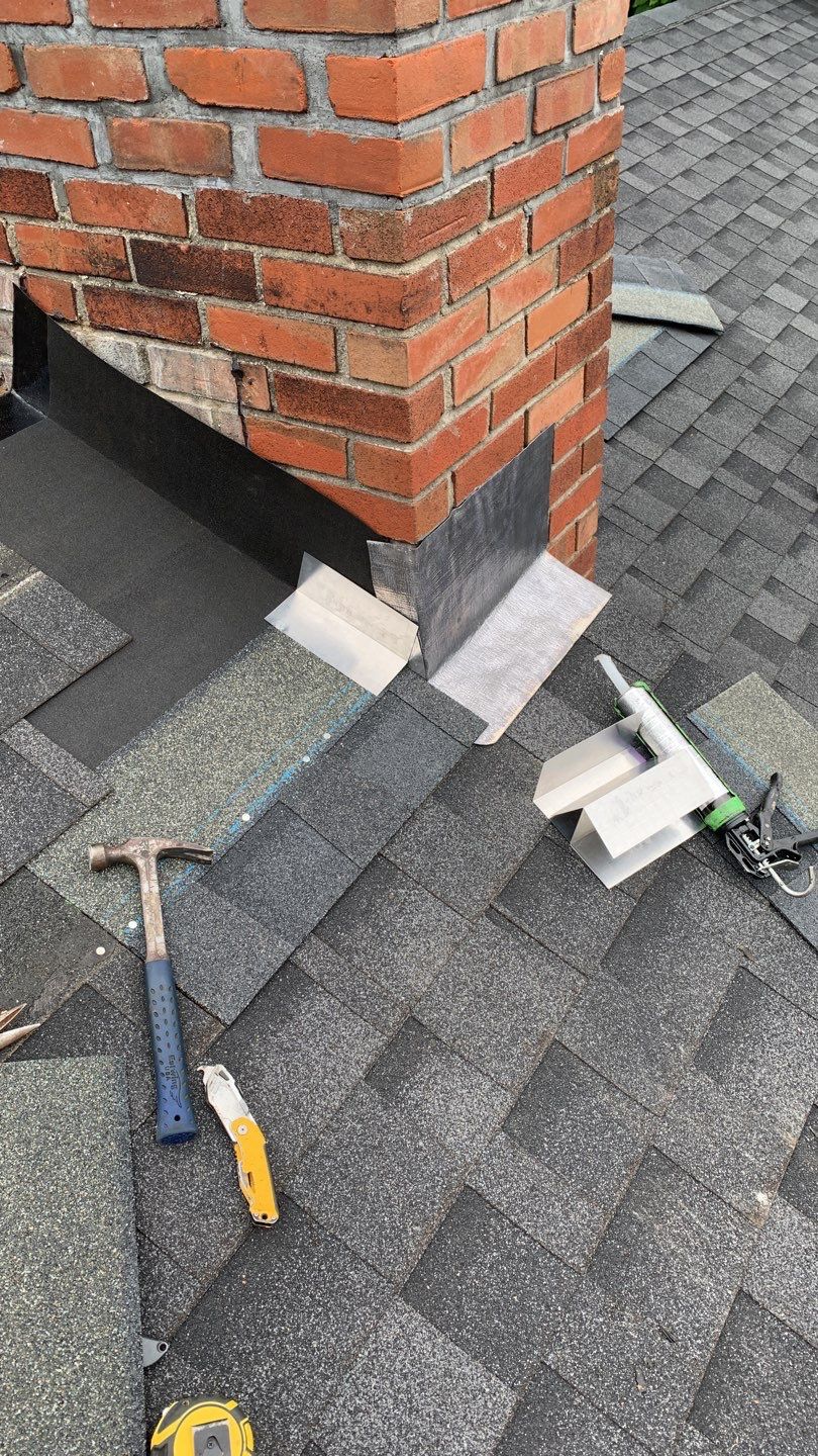 Residential Roofing Repair using Chimney Flashing by A Plus Exterior