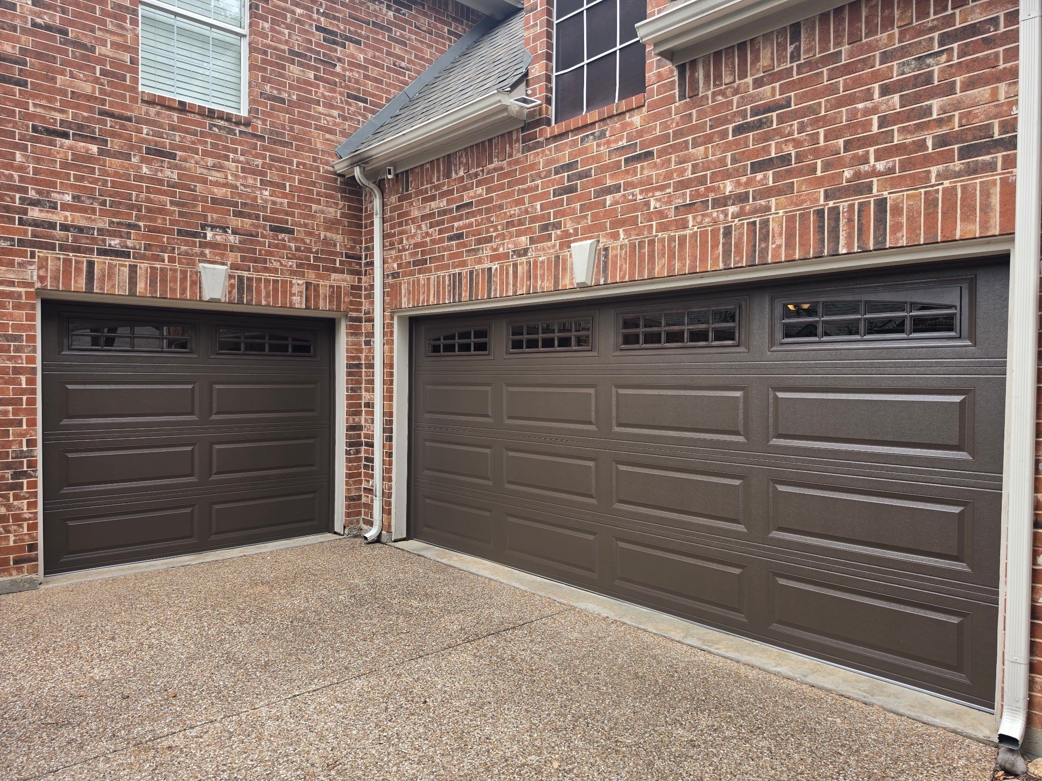 Dark Brown Garage Door Replacement With Decorative Windows in Flower Mound by Meadows Garage Doors