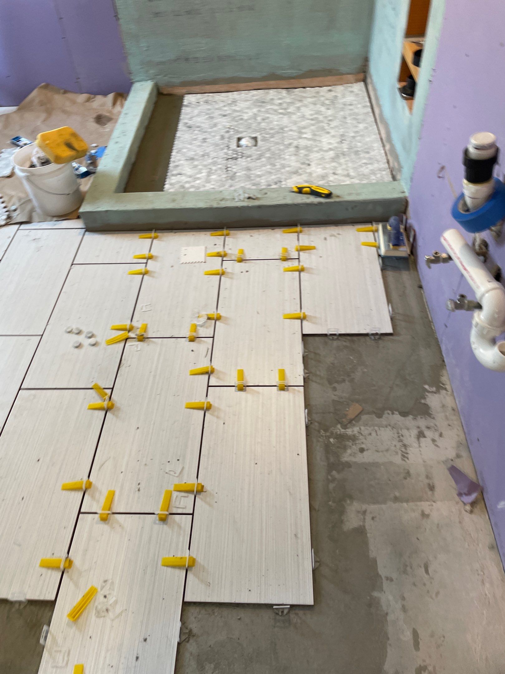 Bathroom Remodel using Schluter by Footprints Floors of Coastal Carolina