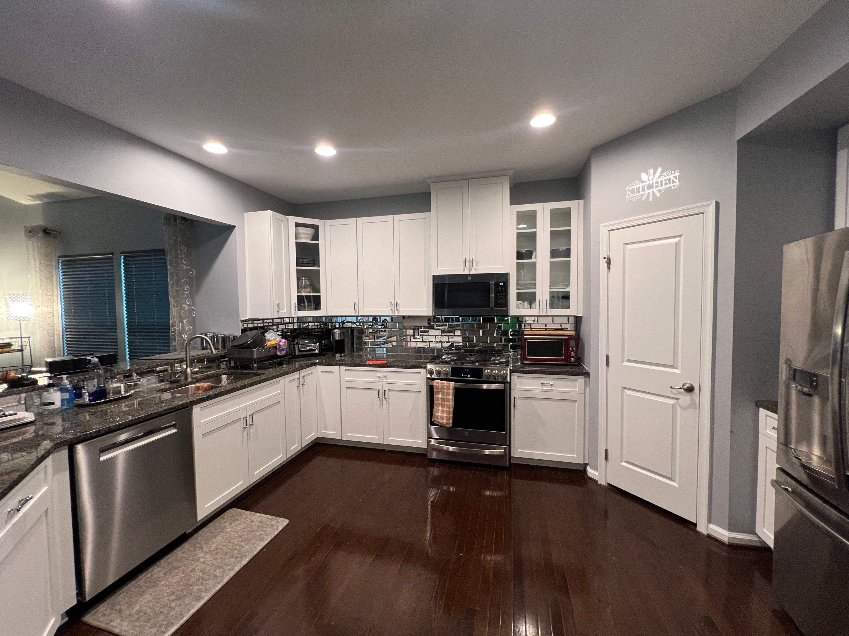 Kitchen Cabinet Painting by GLSpainters