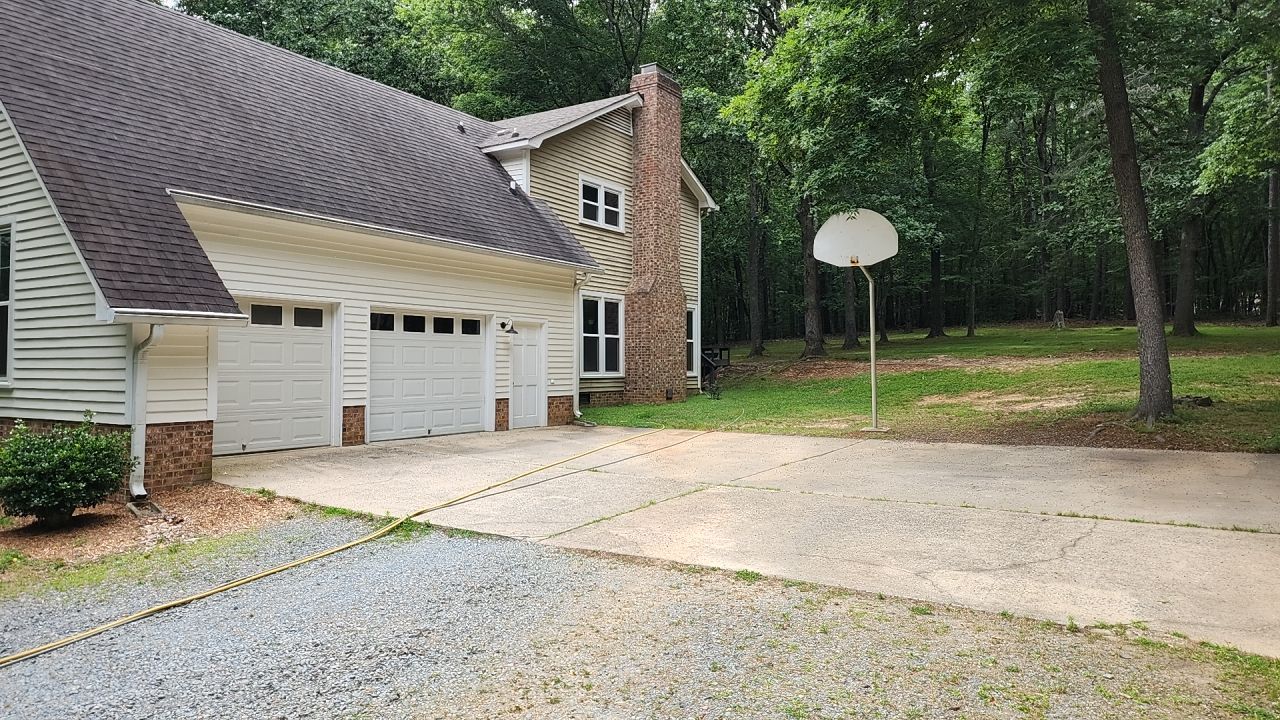 House Wash using cleaner by Power Wash Masters LLC