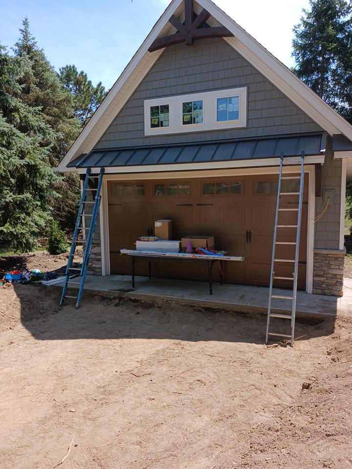 Garage Metal Roof using Standing Seam Metal by Absolute Roofing and Construction