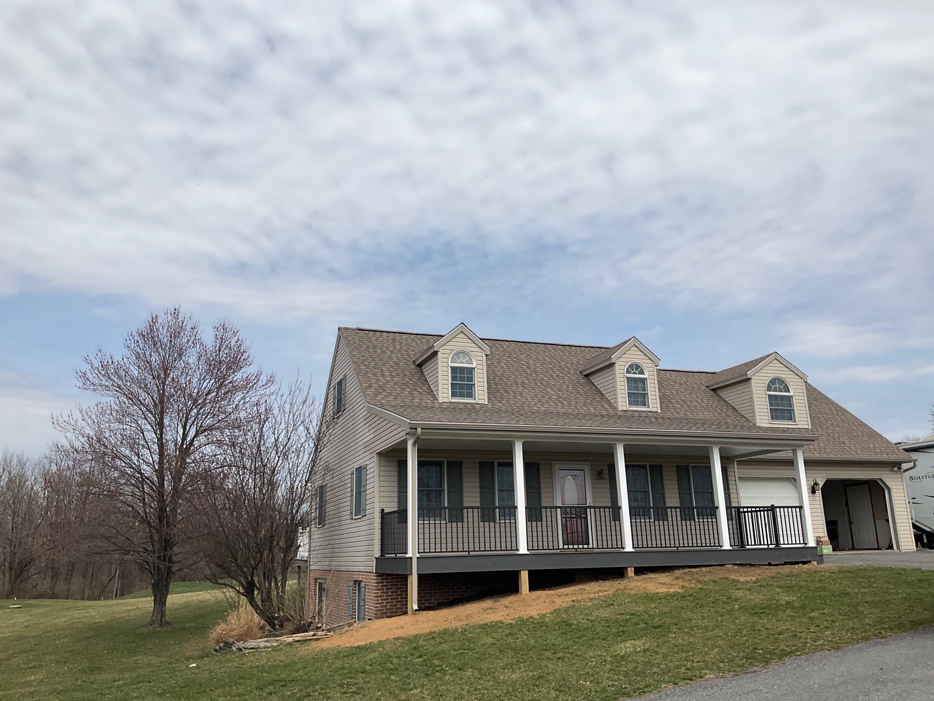 Custom Porch Roof Addition and Siding Renovation in Myerstown, PA by Esh Builders