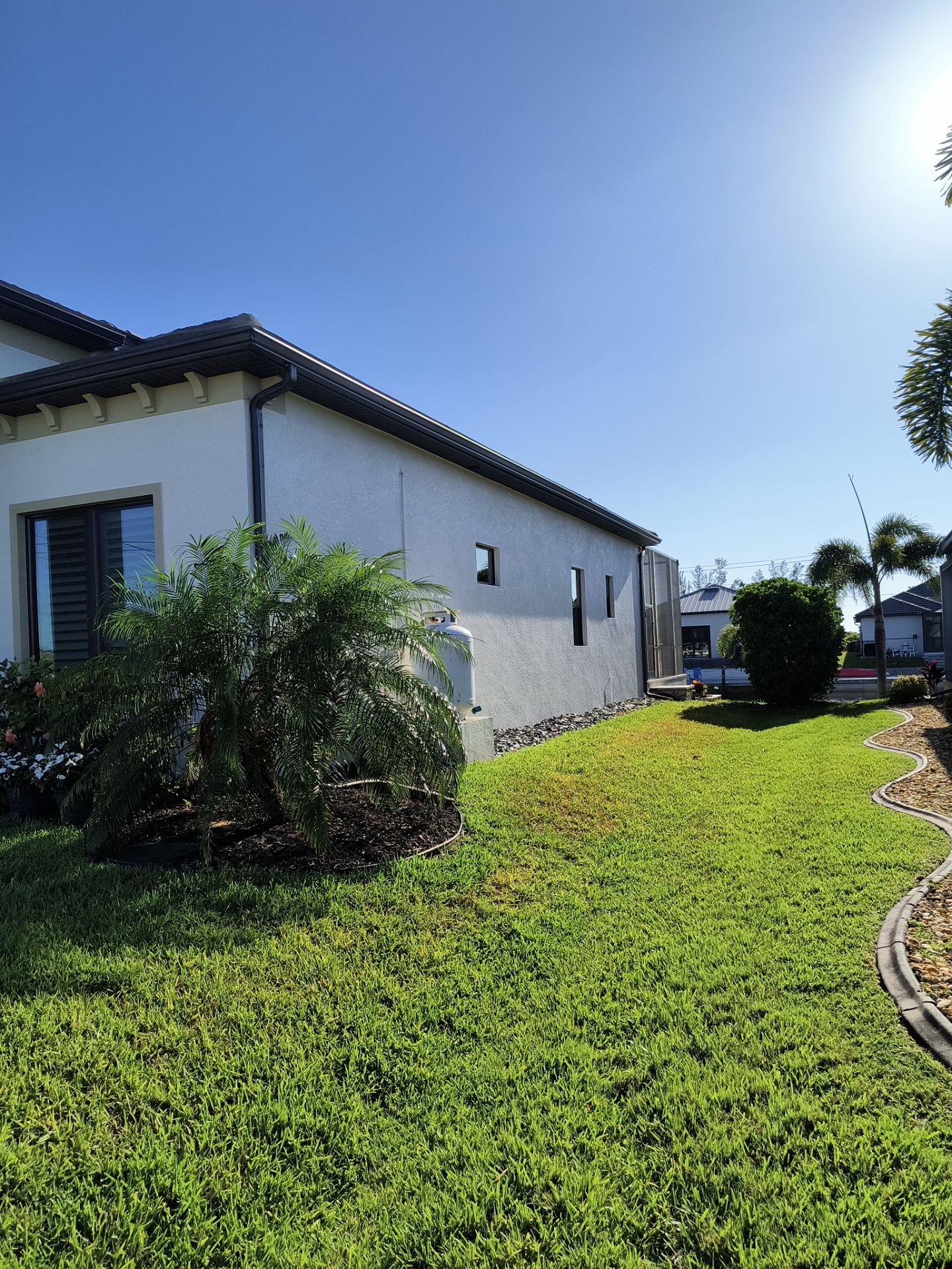 Dark Bronze 7-Inch Gutter Installation in Cape Coral FL by Gutter Professors