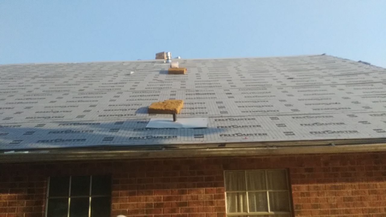 Residential Roofing Installation using Roof Replacement by American Roofing & Construction LLC