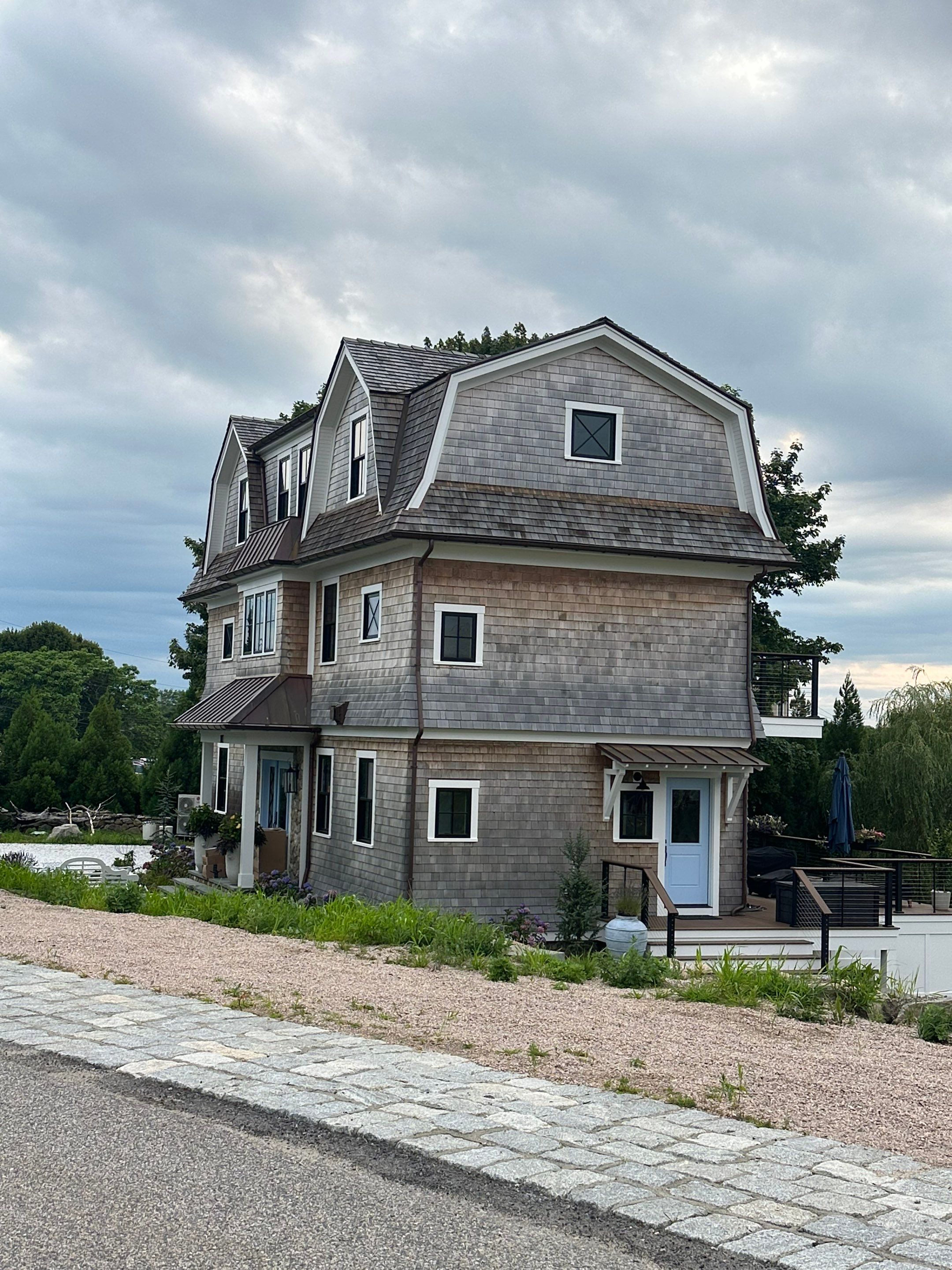 Great Island - Red Cedar Roofing, Yellow Cedar Siding, Standing Seam Copper, & Copper Gutters by Rinaldi Brothers