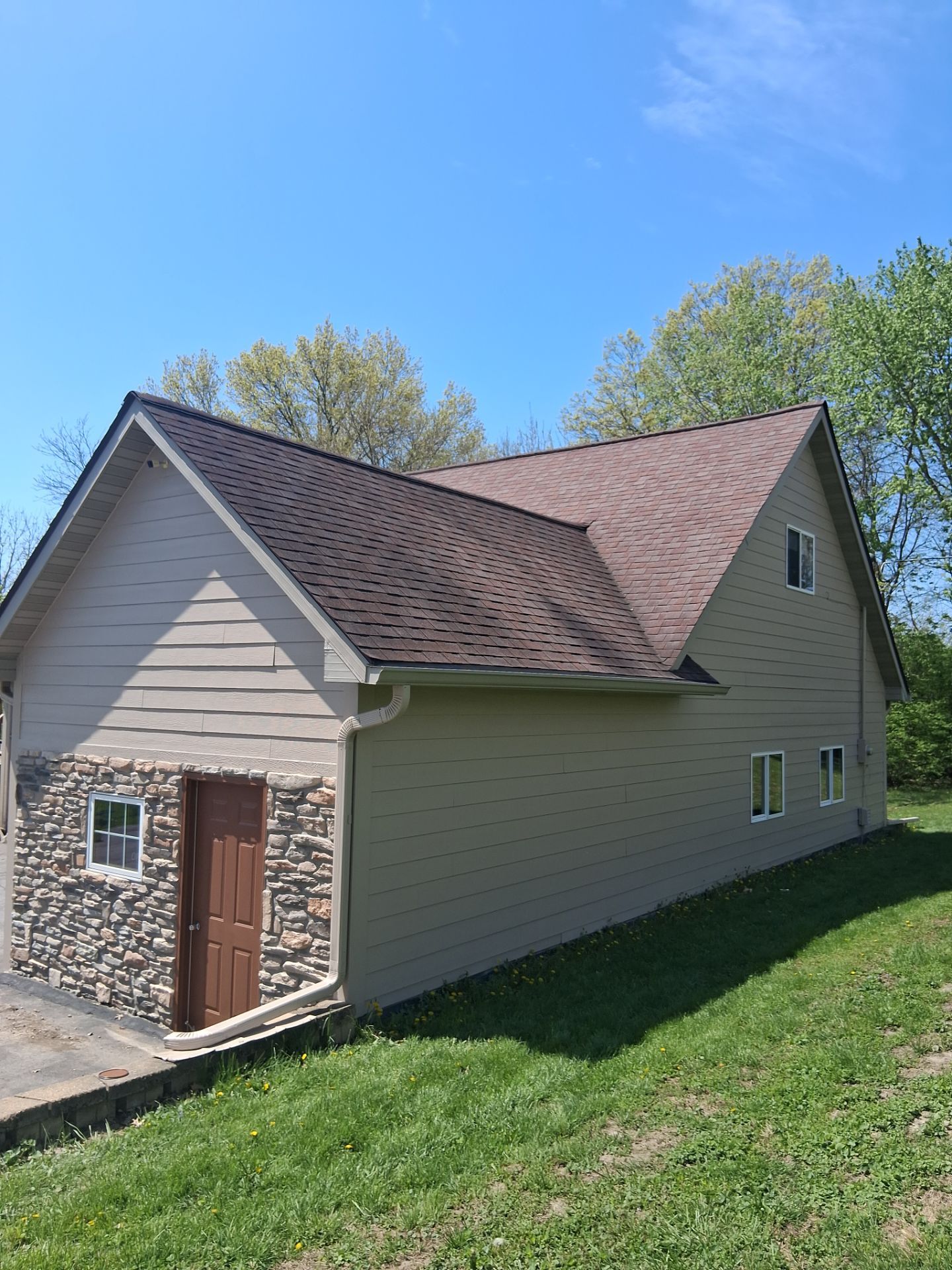 Residential Exterior Repaint Including Shop and Shed  by Midwest Paint LLC