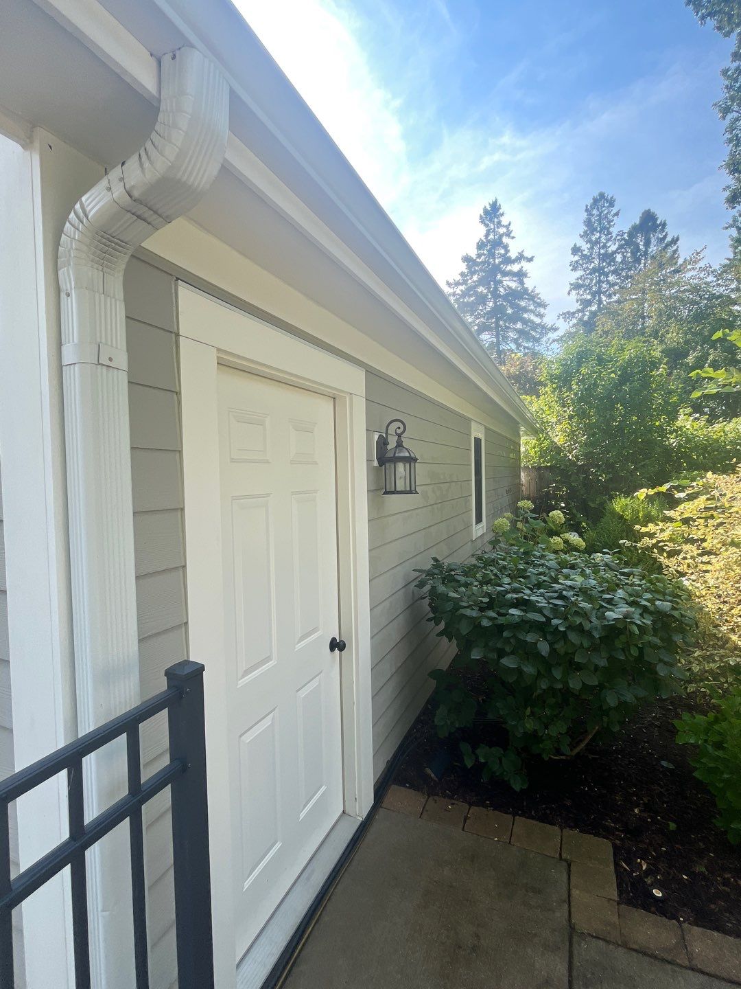 Hardie Board House & Detached Garage Soft Washing by Northern Power Washing LLC.