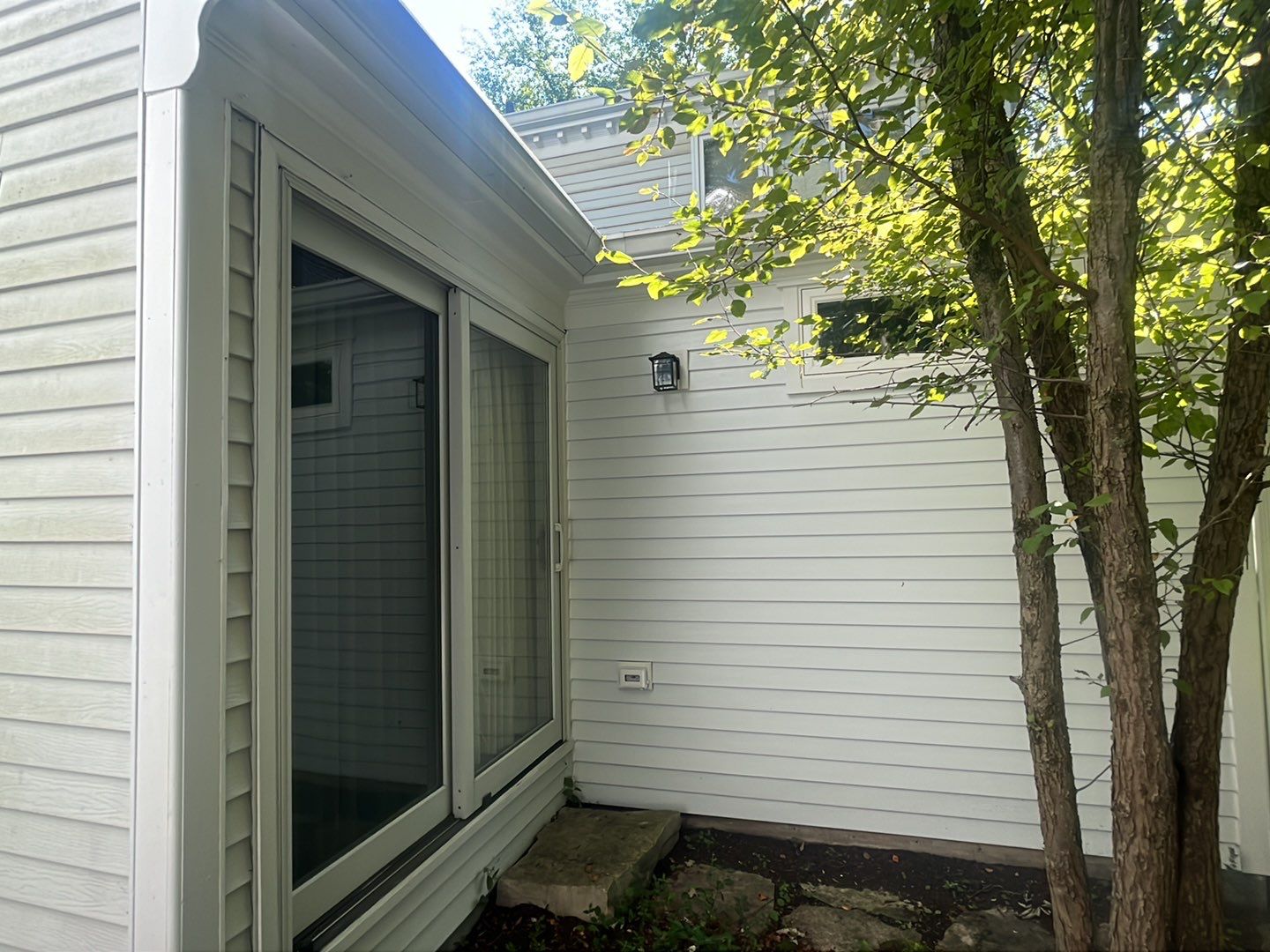 Housewashing  using Algaecide, soft wash soap by Northern Power Washing LLC.