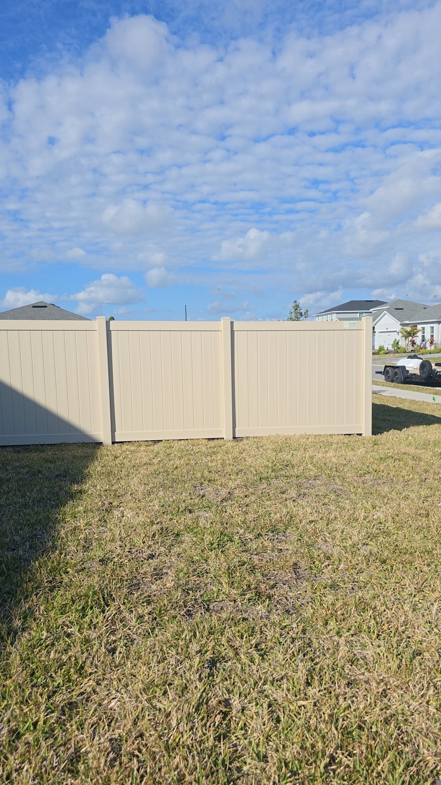 Tan Vinyl Fence in West Port by True Fence LLC