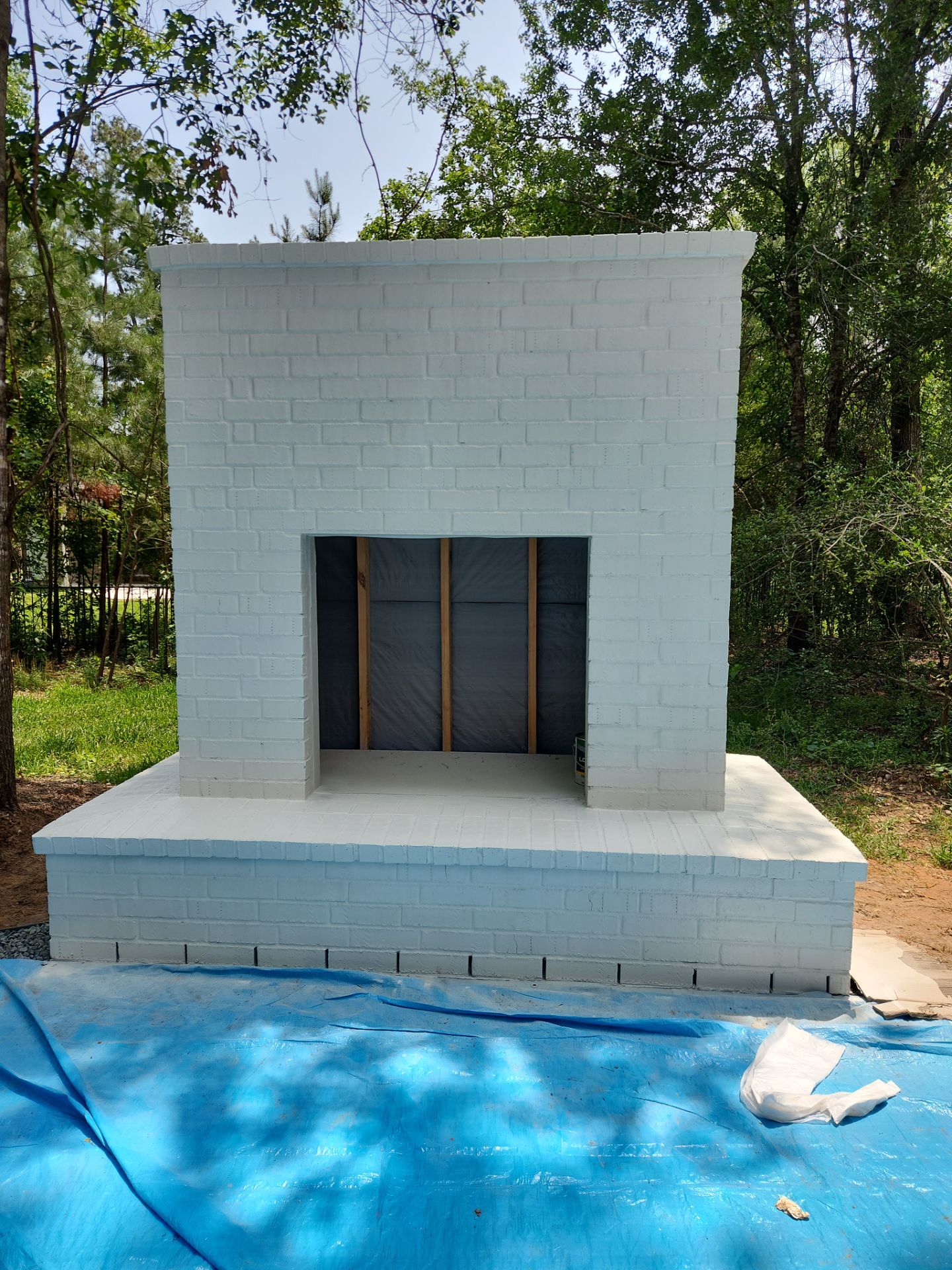 Outdoor Fireplace in Tomball, TX by SophAlx LLC