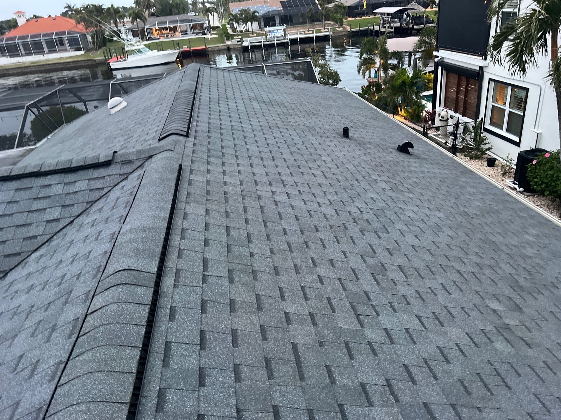 Residential Roofing Installation using Pinnacle Pristine Shingle in Pewter Gray by Durabilis Roofing INC