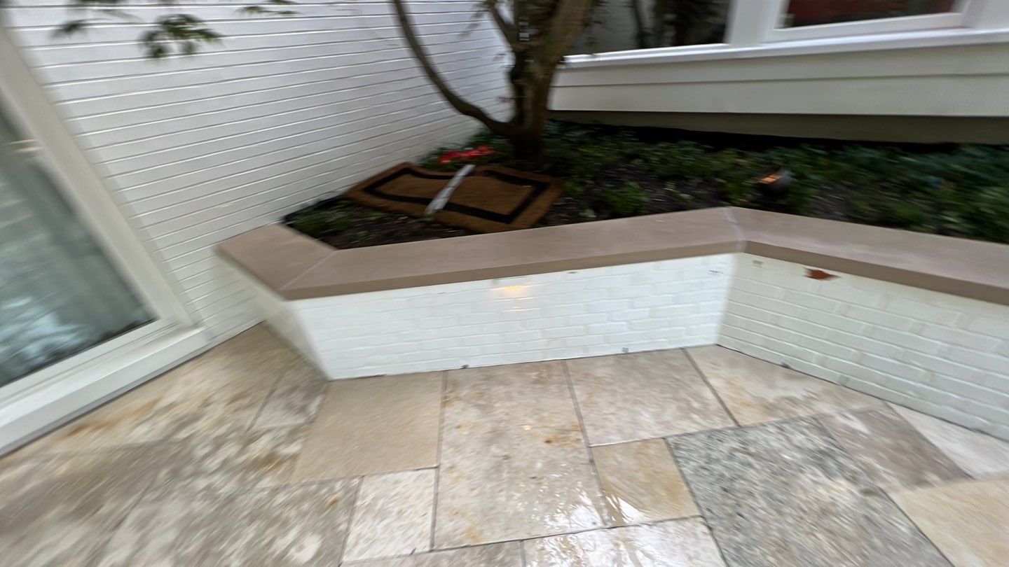 marble patio cleaning and sanding using Polysweep polymeric sand by Northern Power Washing LLC.