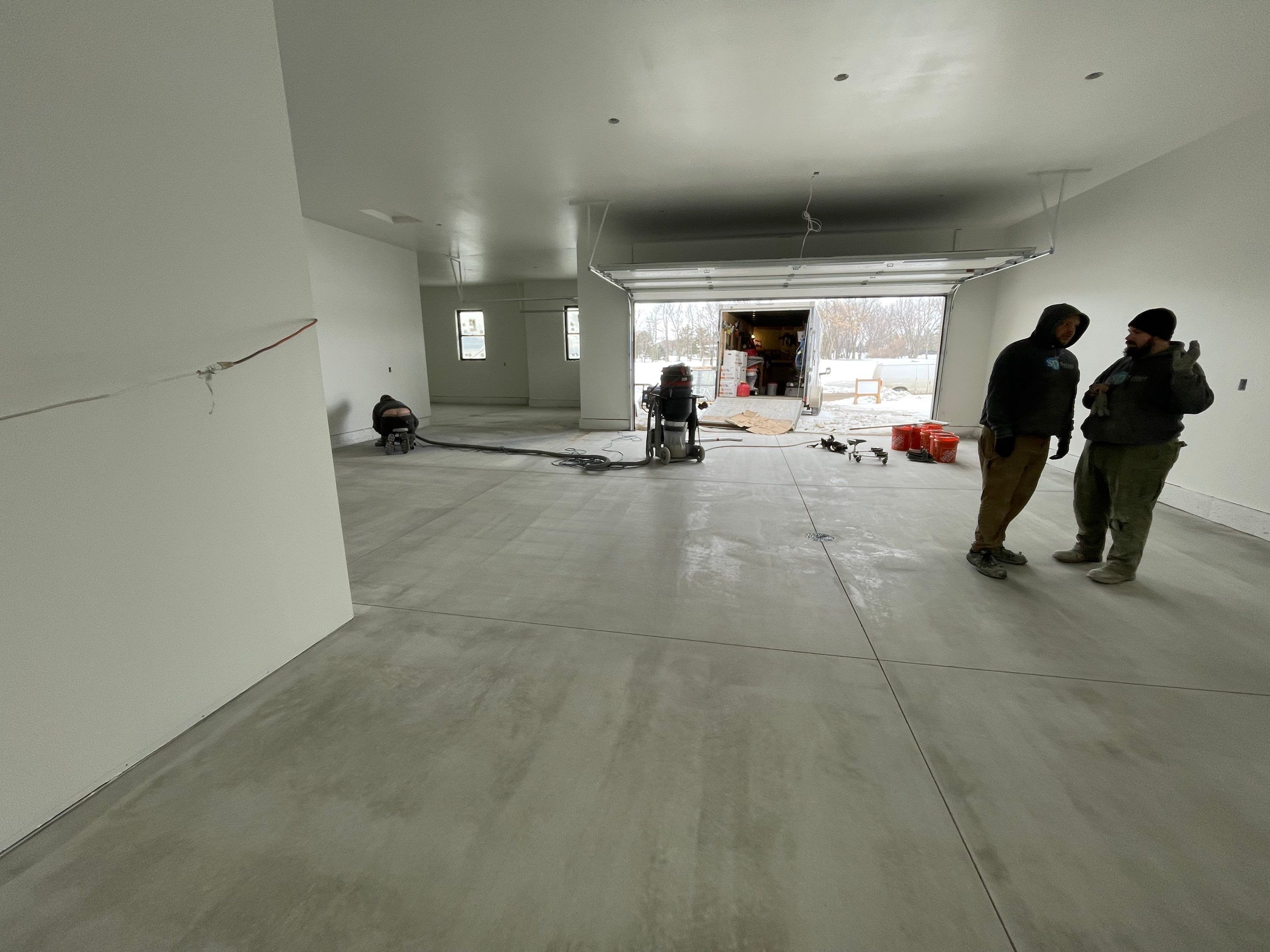Garage using Slate Stone by Select Painting, Coatings & Garage Cabinets