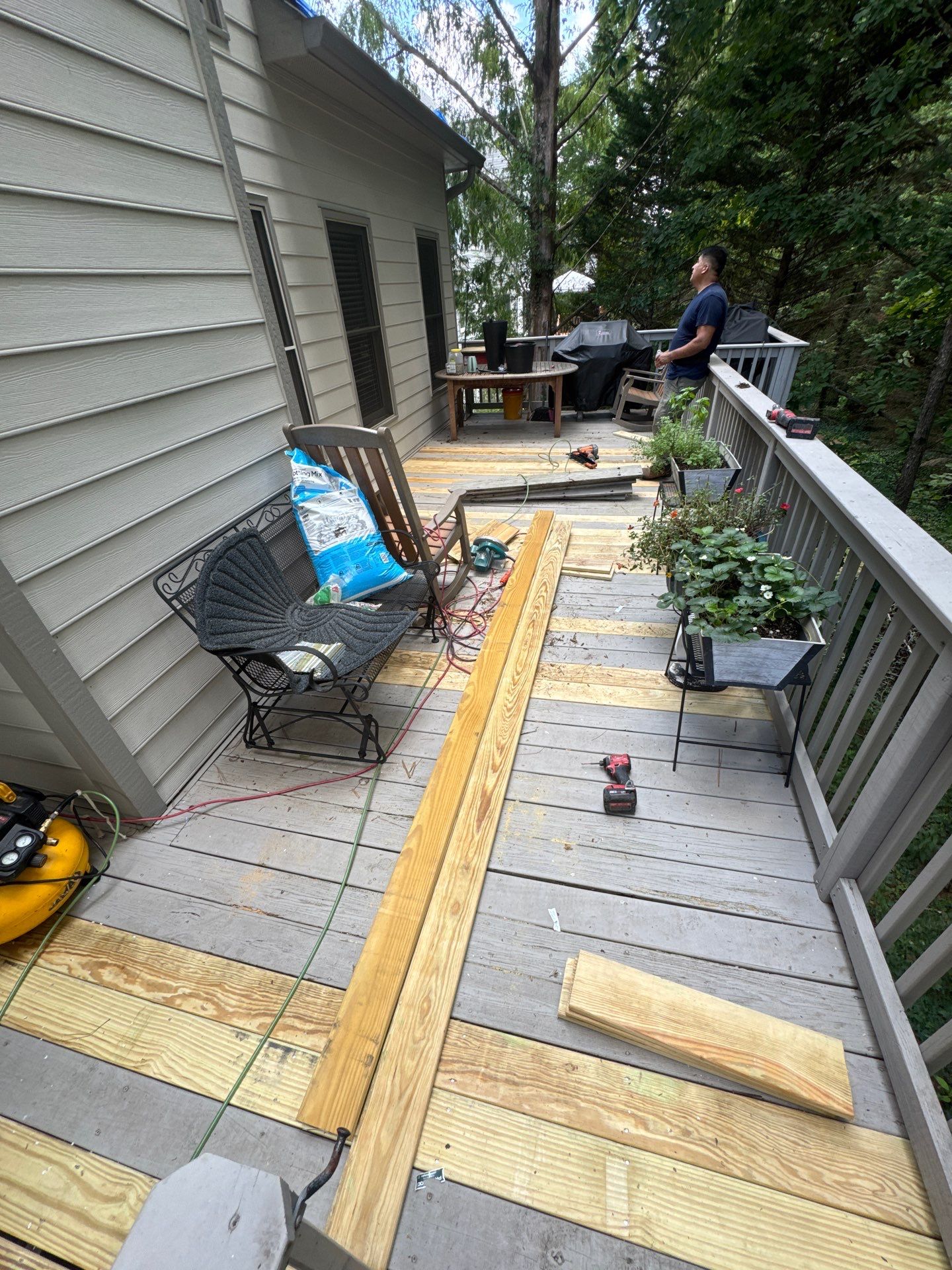Exterior Trim Painting and Deck Board Replacement in Smyrna by Swift Home Renovations