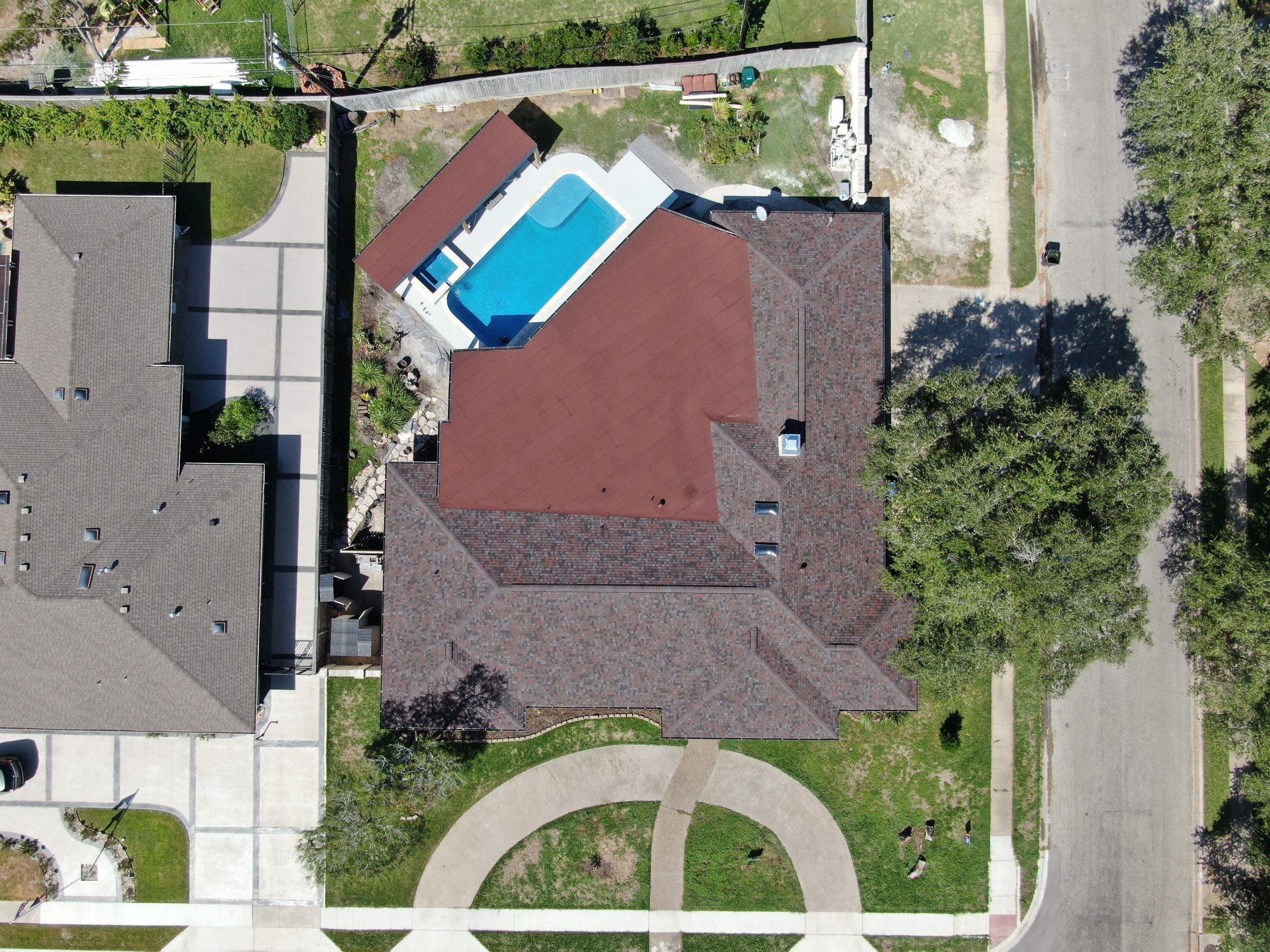 Beautiful pool side build by Bayfront Roofing and Construction