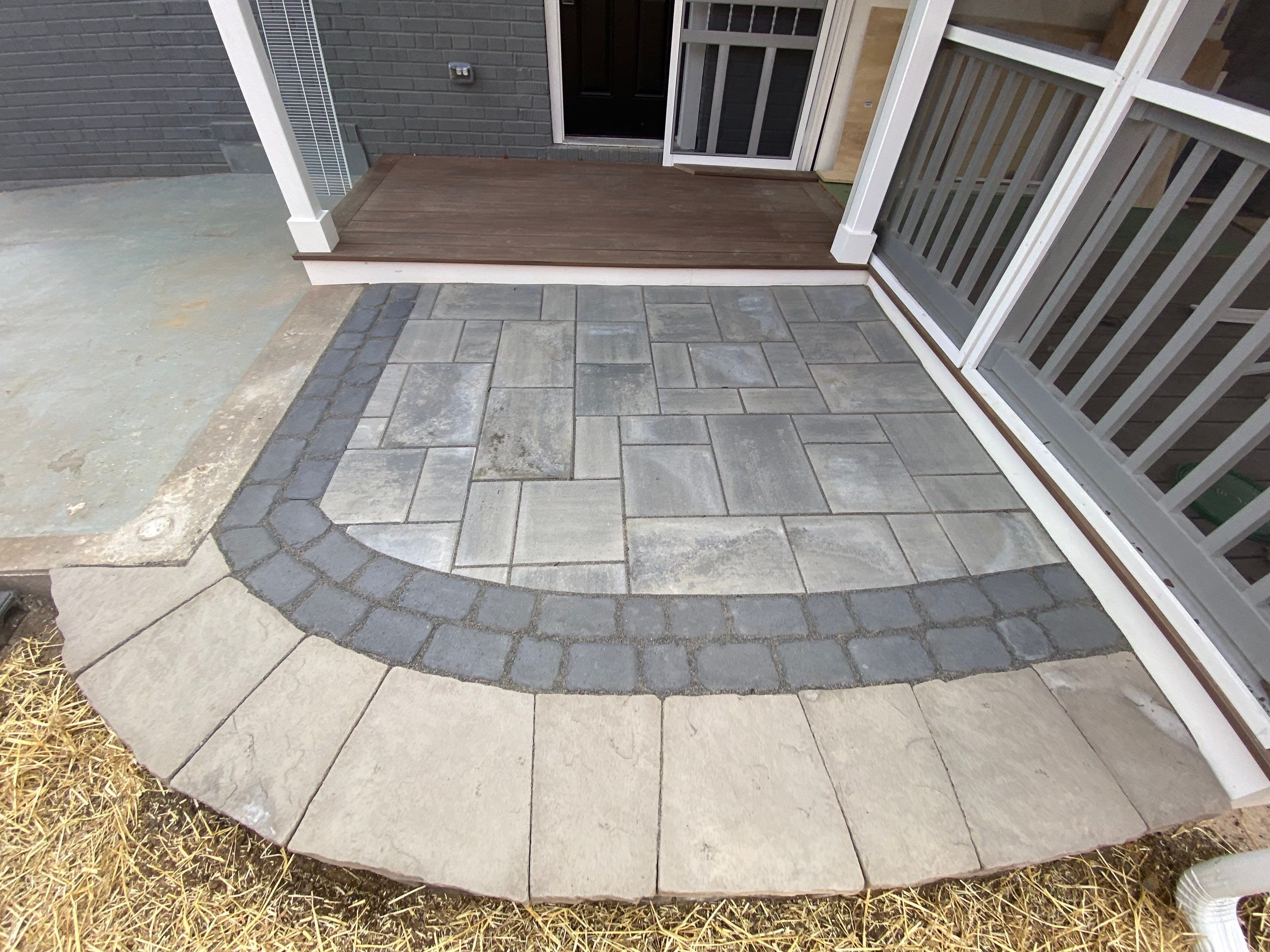 Retaining wall, walkway, small patio and landscape install by The Smet Companies, LLC