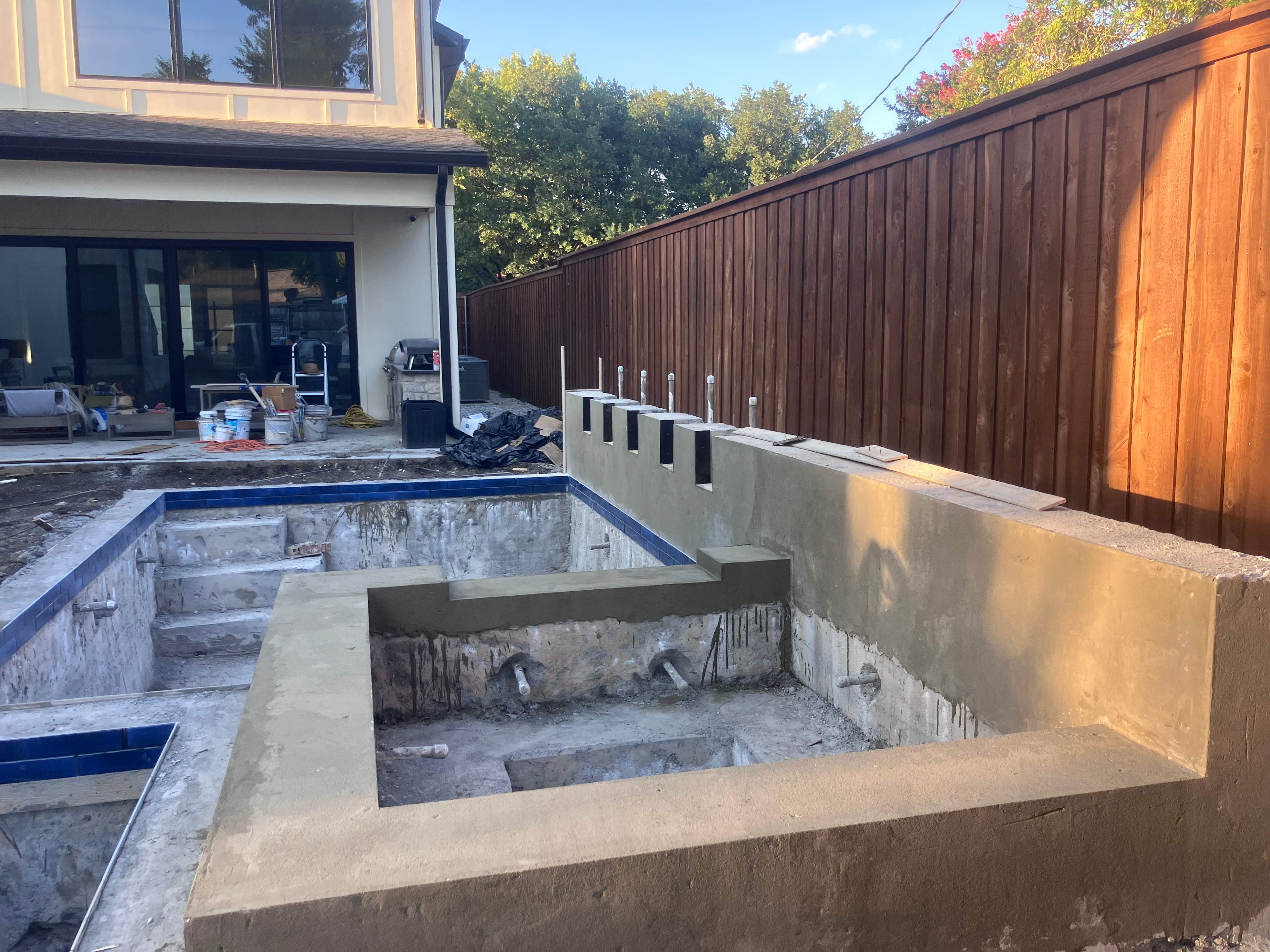 Modern Geometric Pool and Spa with Turf-Strip Decking by Pinnacle Pools and Spas - DFW