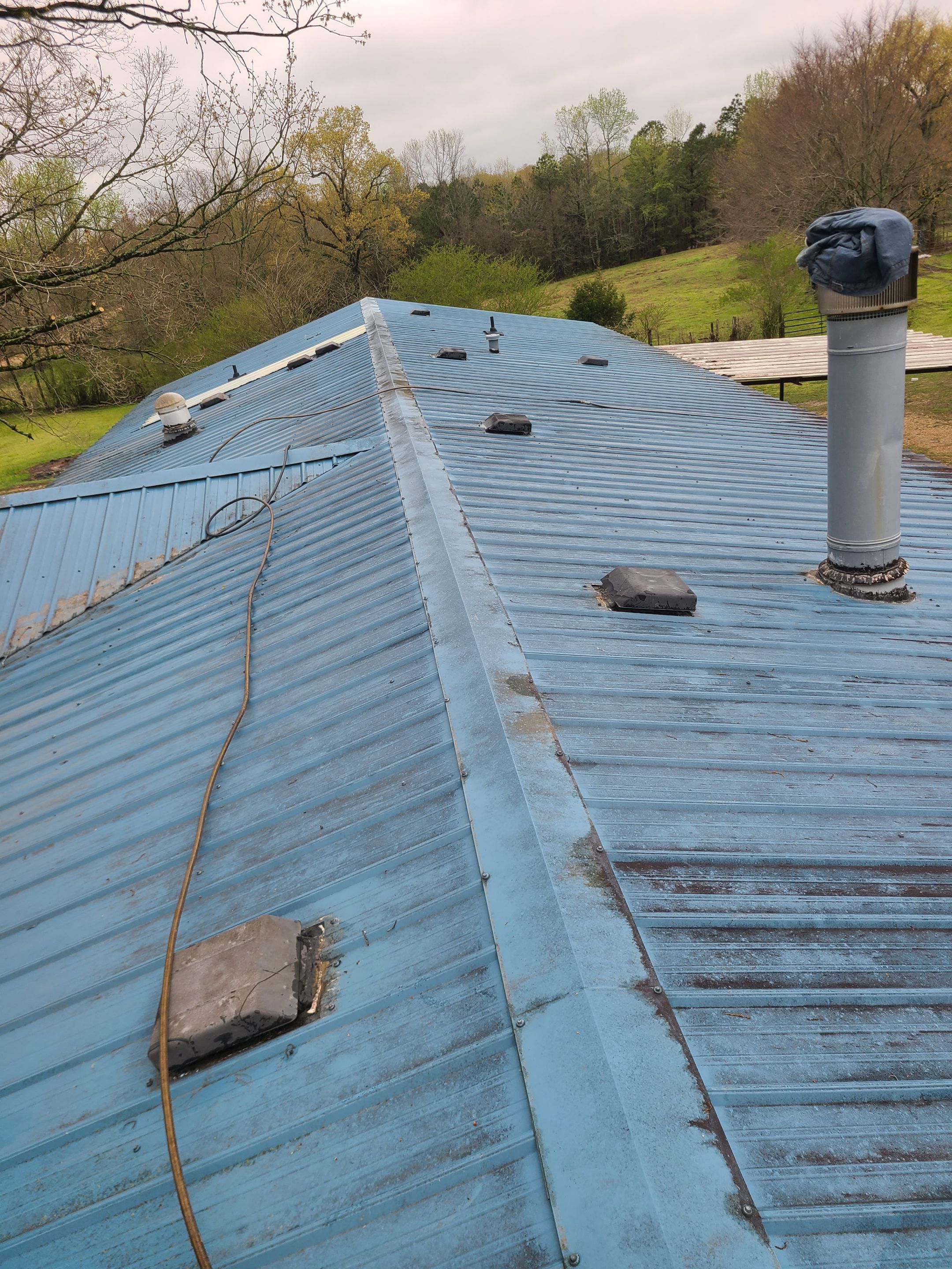Commercial Roofing Installation using Aldocoat Coatings by Hostetler Roofing