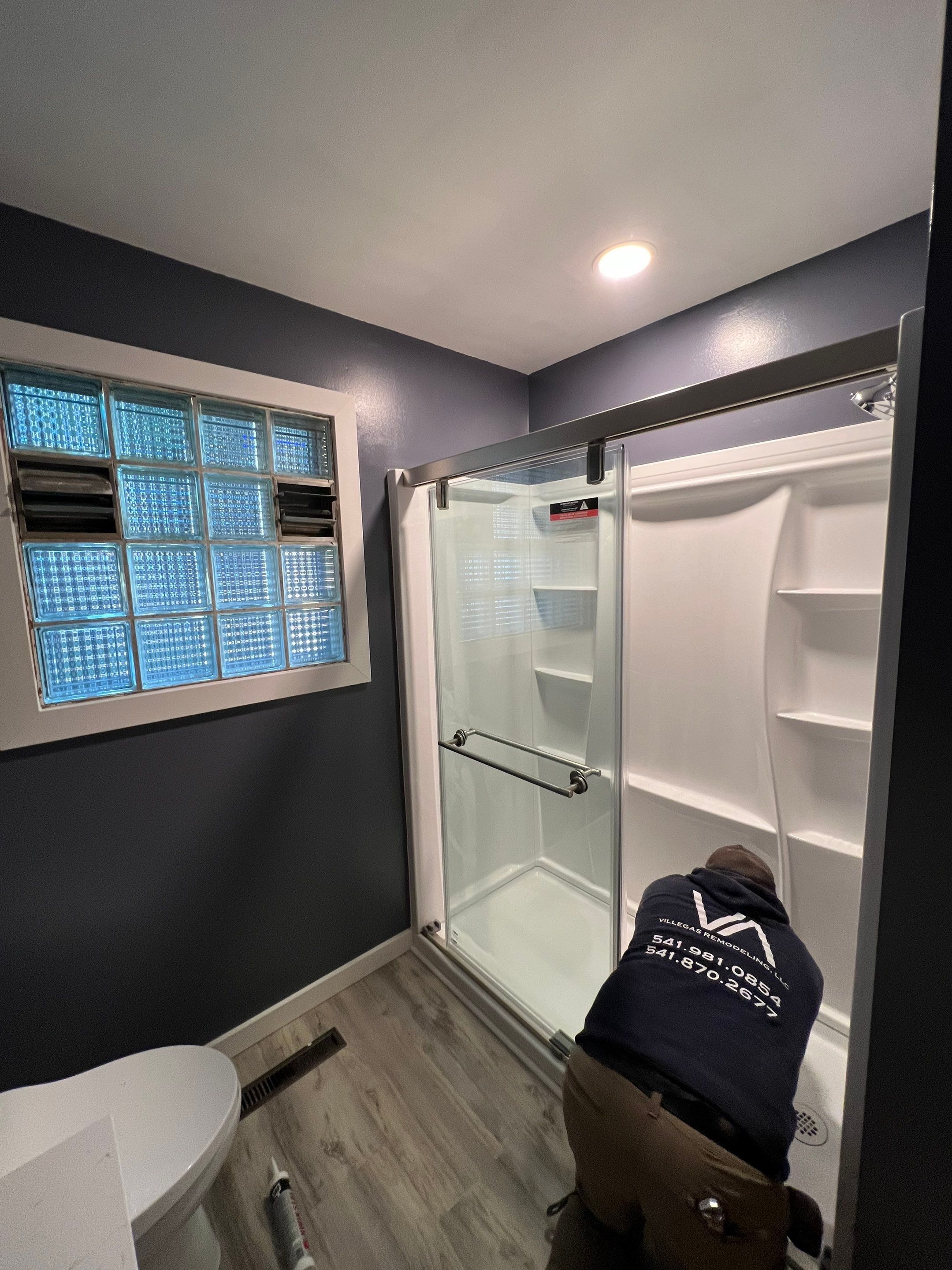 Bathroom Remodel using Shower Kit by Villegas Remodeling, LLC