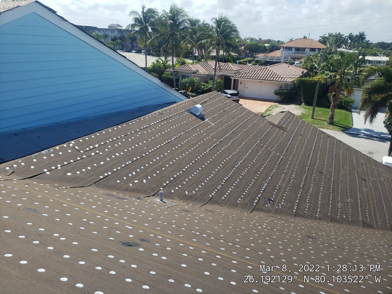 Residential Roofing Installation using 1" Nail strip metal roof by BLUES BROTHERS CONSTRUCTION CORP