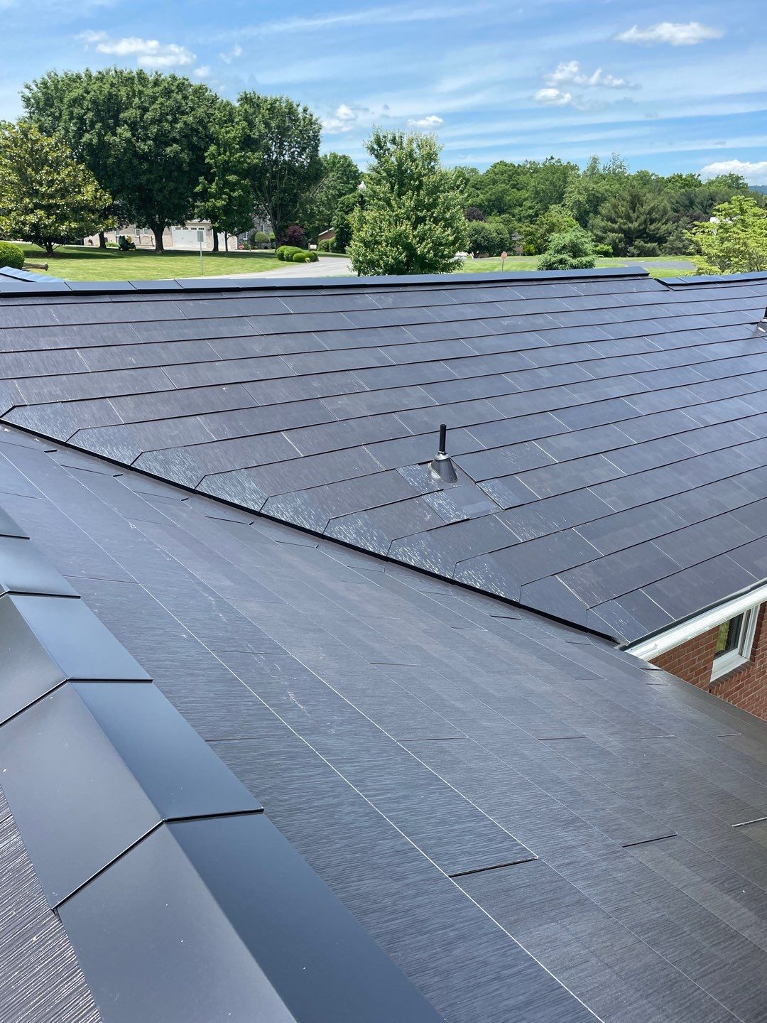 Tesla Solar Roof Installation by American Home Contractors