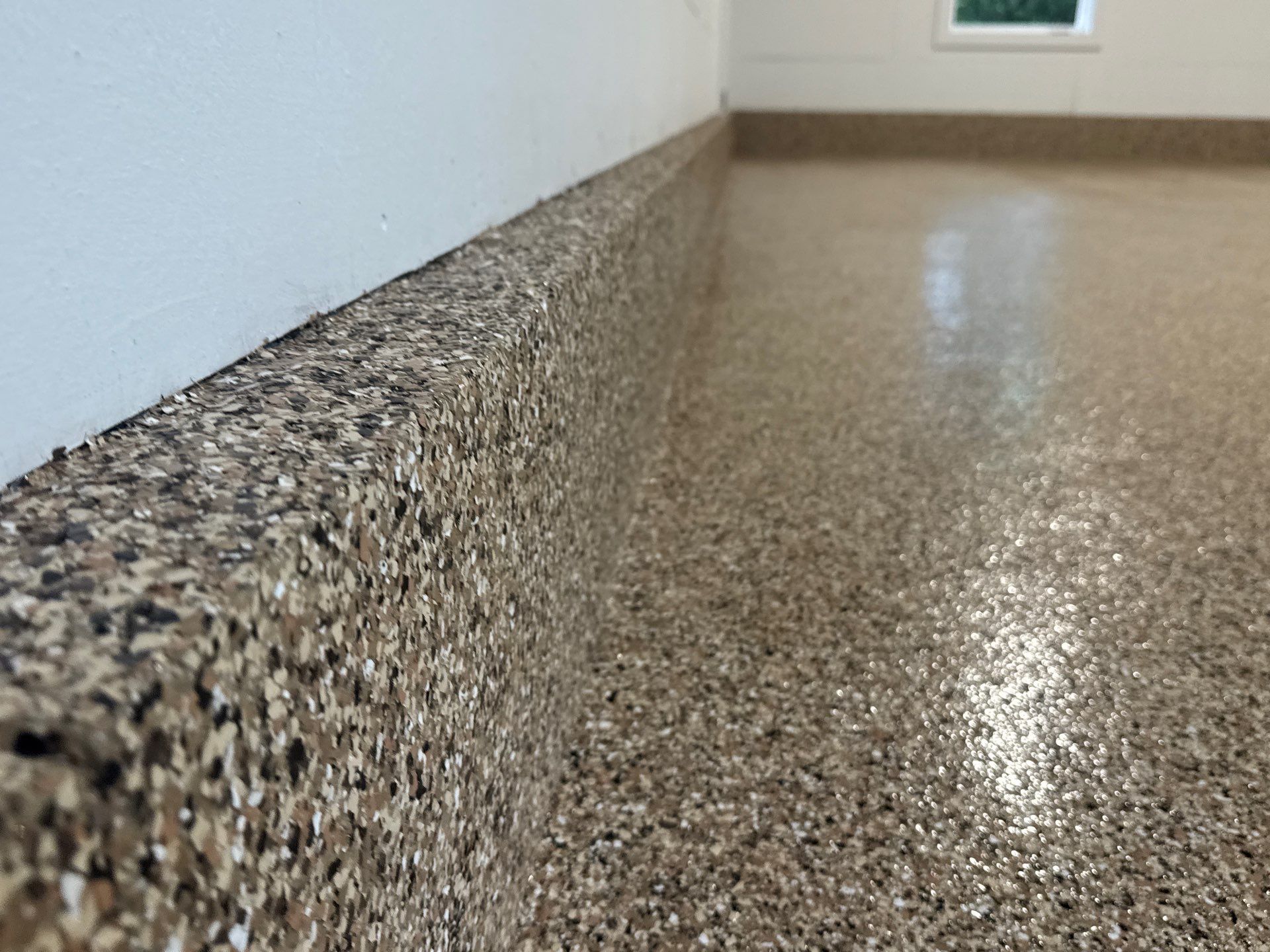 Garage in Gainesville, FL in Sandstone by Cross Creek Concrete Coatings