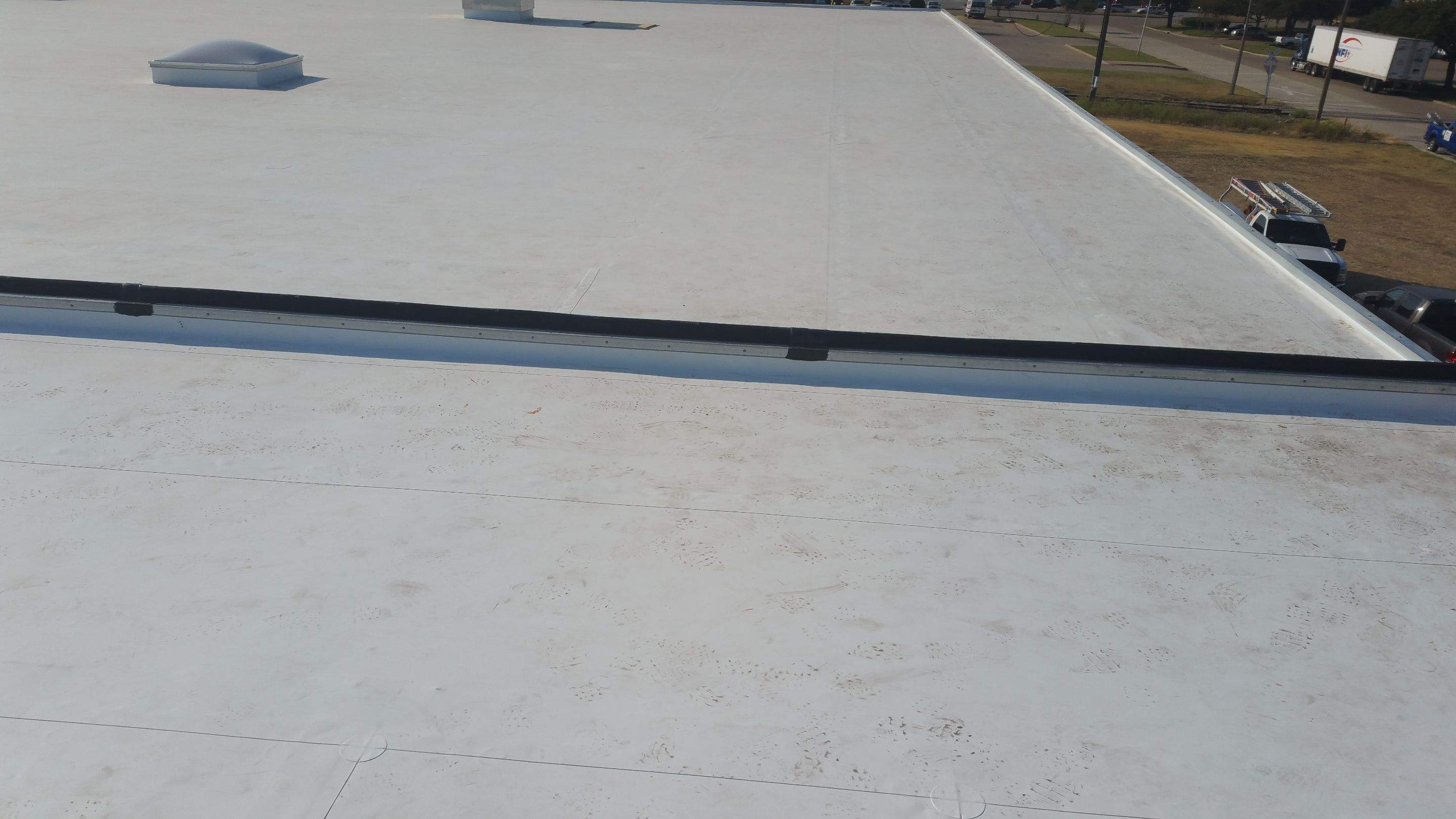 Massive Storm Damage Project - Factory in Arlington by First United Roofing & Construction
