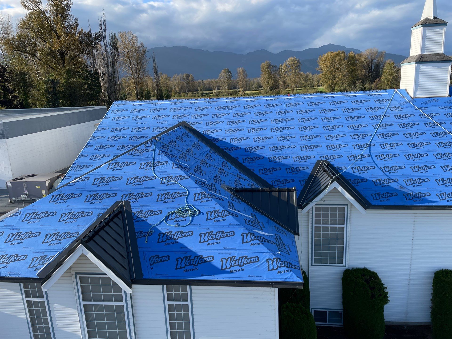 Commercial Shingle to Metal Conversion using Prolok 12 - 26g - Standard option by Top Notch Roofing Inc