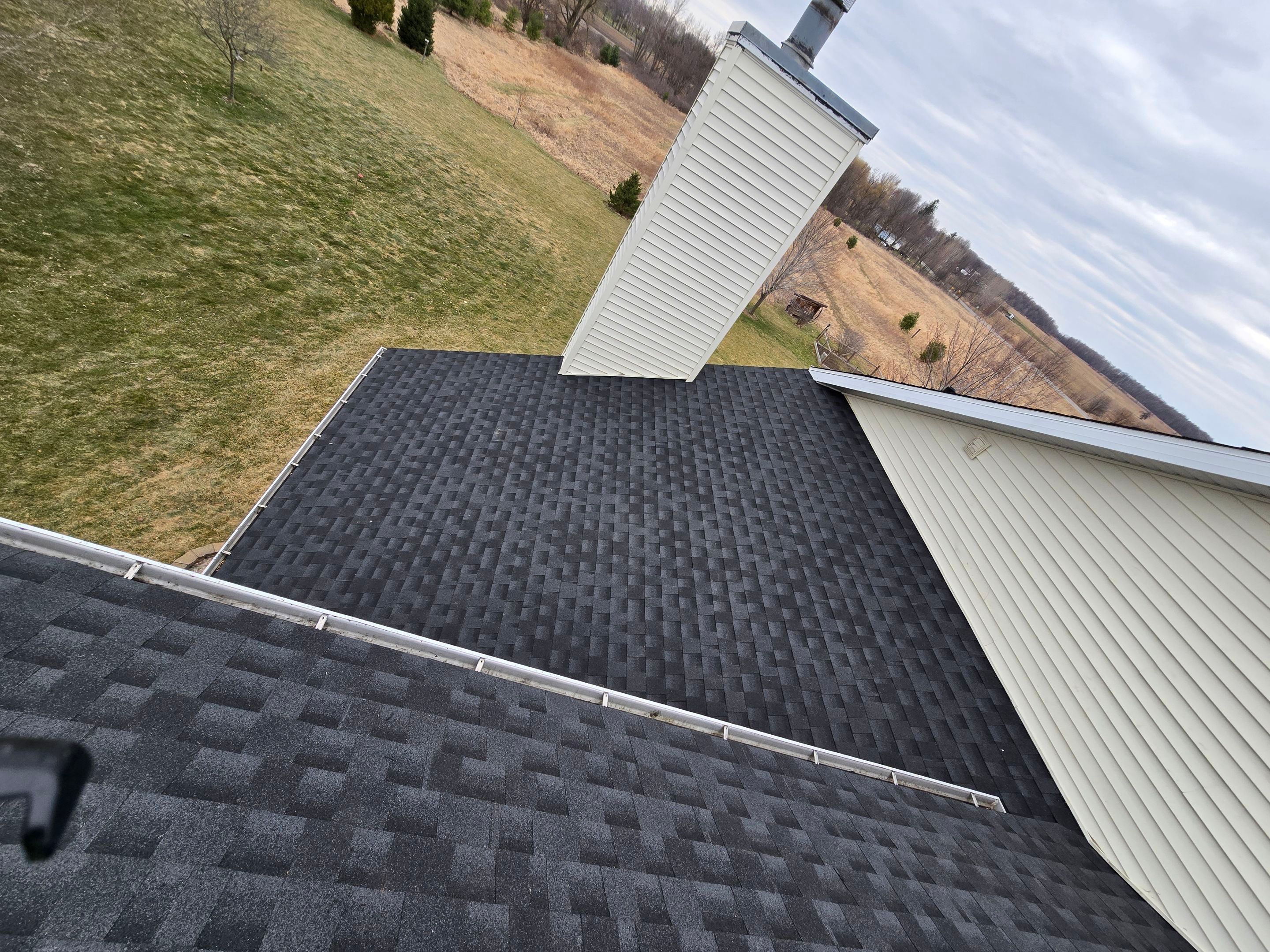 Re-roofing with GAF Timberline HDZ Shingles in Charcoal by Acme Exteriors