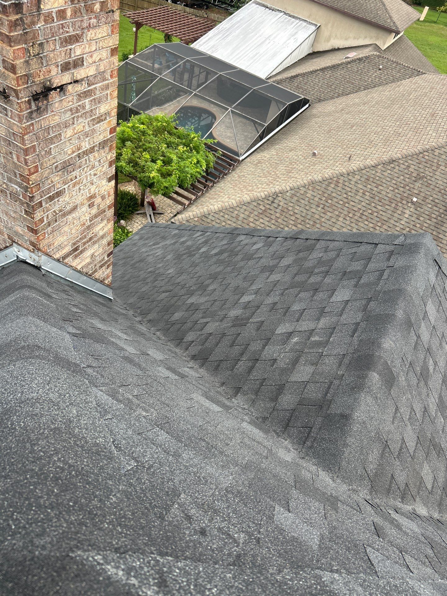 Residential Roofing Installation with Black Shadow Shingles in Clermont by Pinnacle Roofing Group