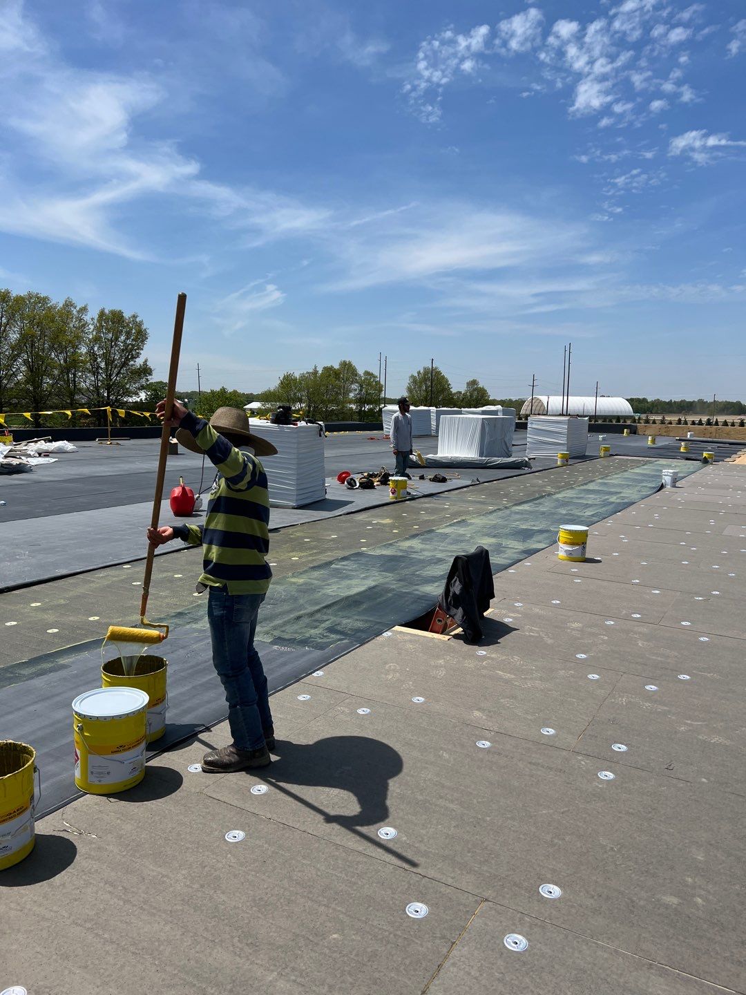 Commercial Roofing Installation using 60 mil rubber roof  by Nitro Roofing and Construction