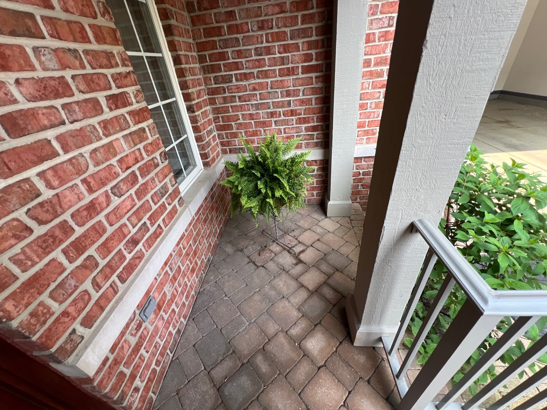 Brick paver cleaning sanding and sealing by Northern Power Washing LLC.