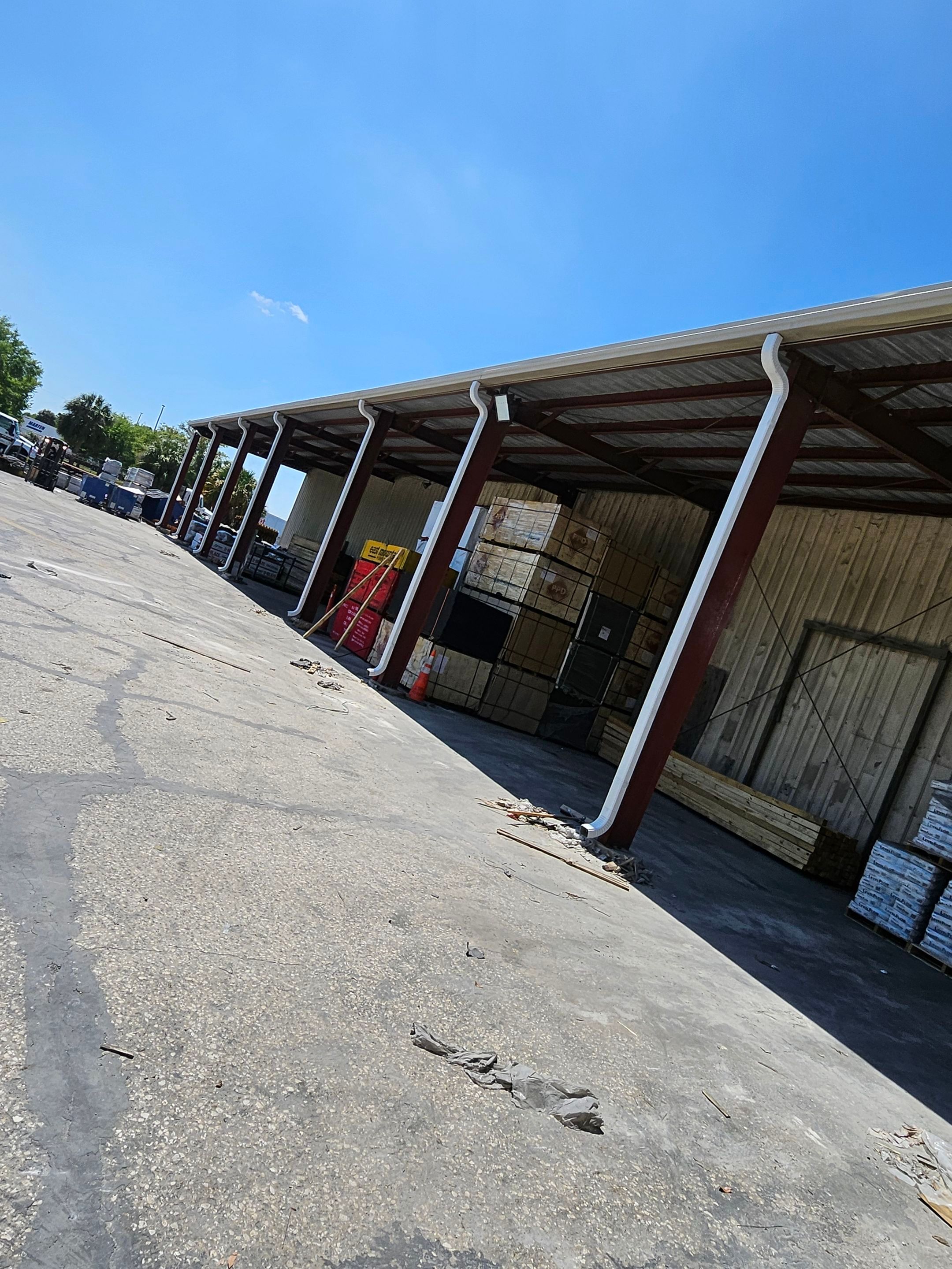 Commercial Box Gutters and White Downspouts Installation in Tampa FL by Gutter Professors