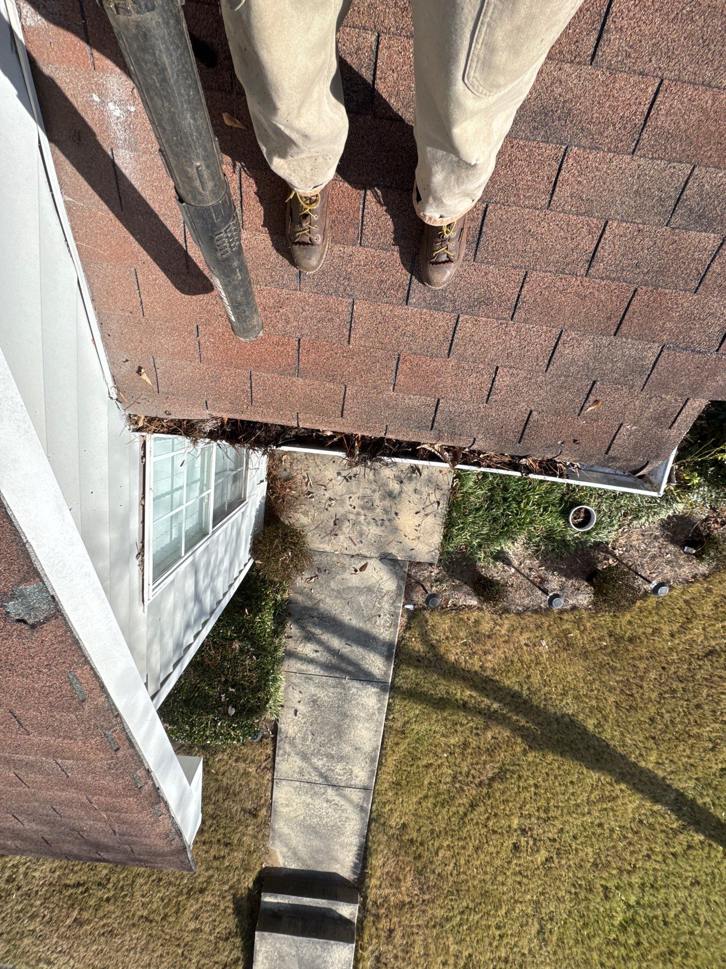 Commercial gutter cleaning Georgia before photo with filled gutters