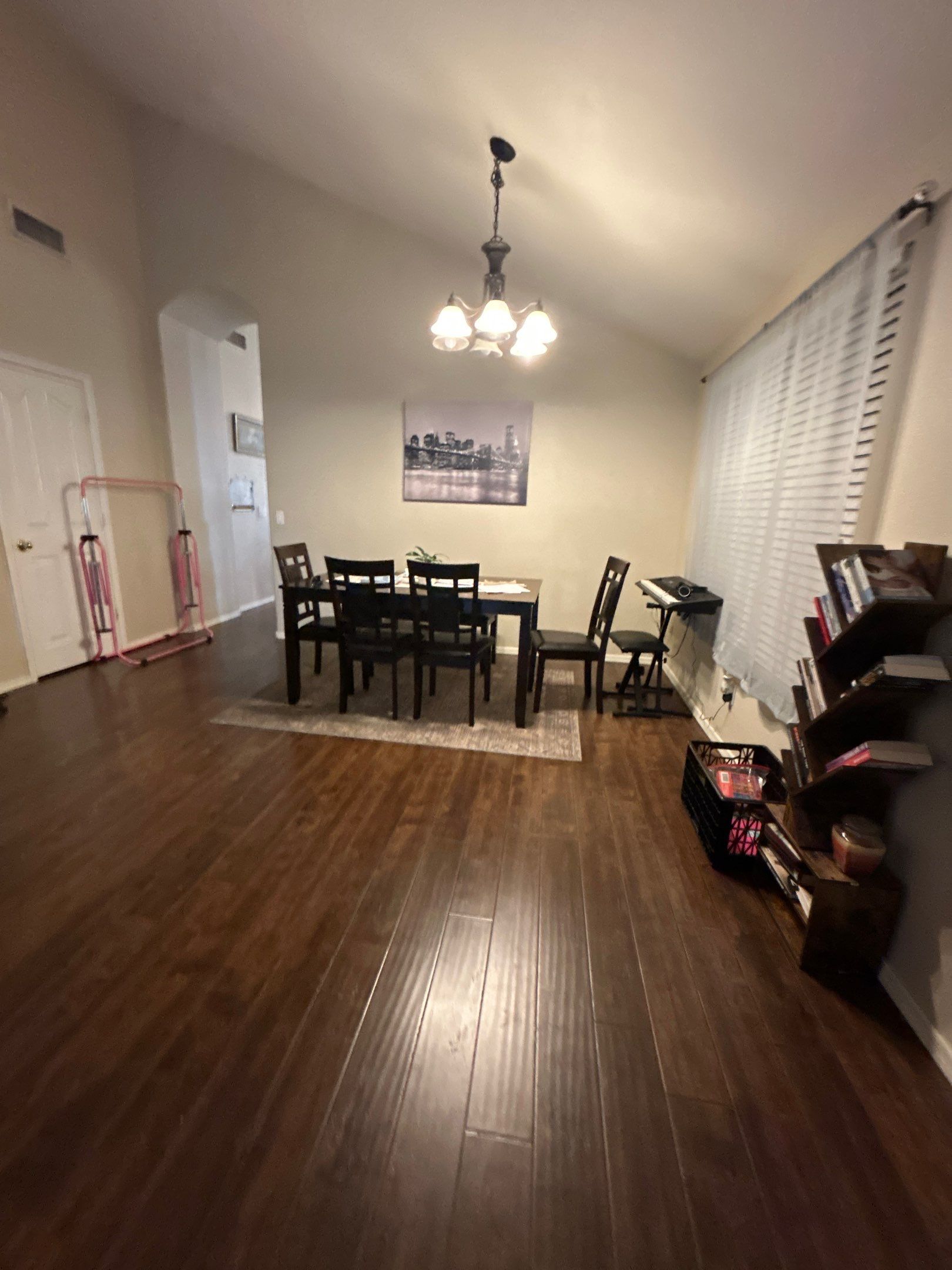 Interior Dining Room Renovation with Dark Wood Flooring by CompanyCam Sales Demo
