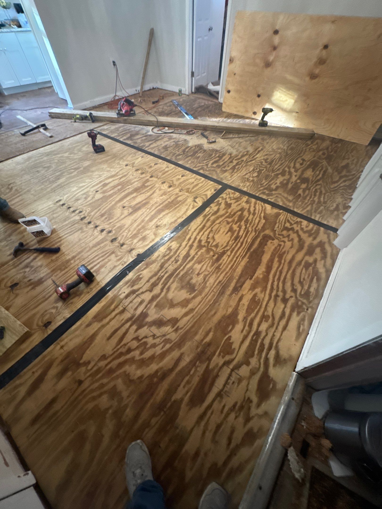 Subfloor Repairs & Flooring Installation by Axtra Hand