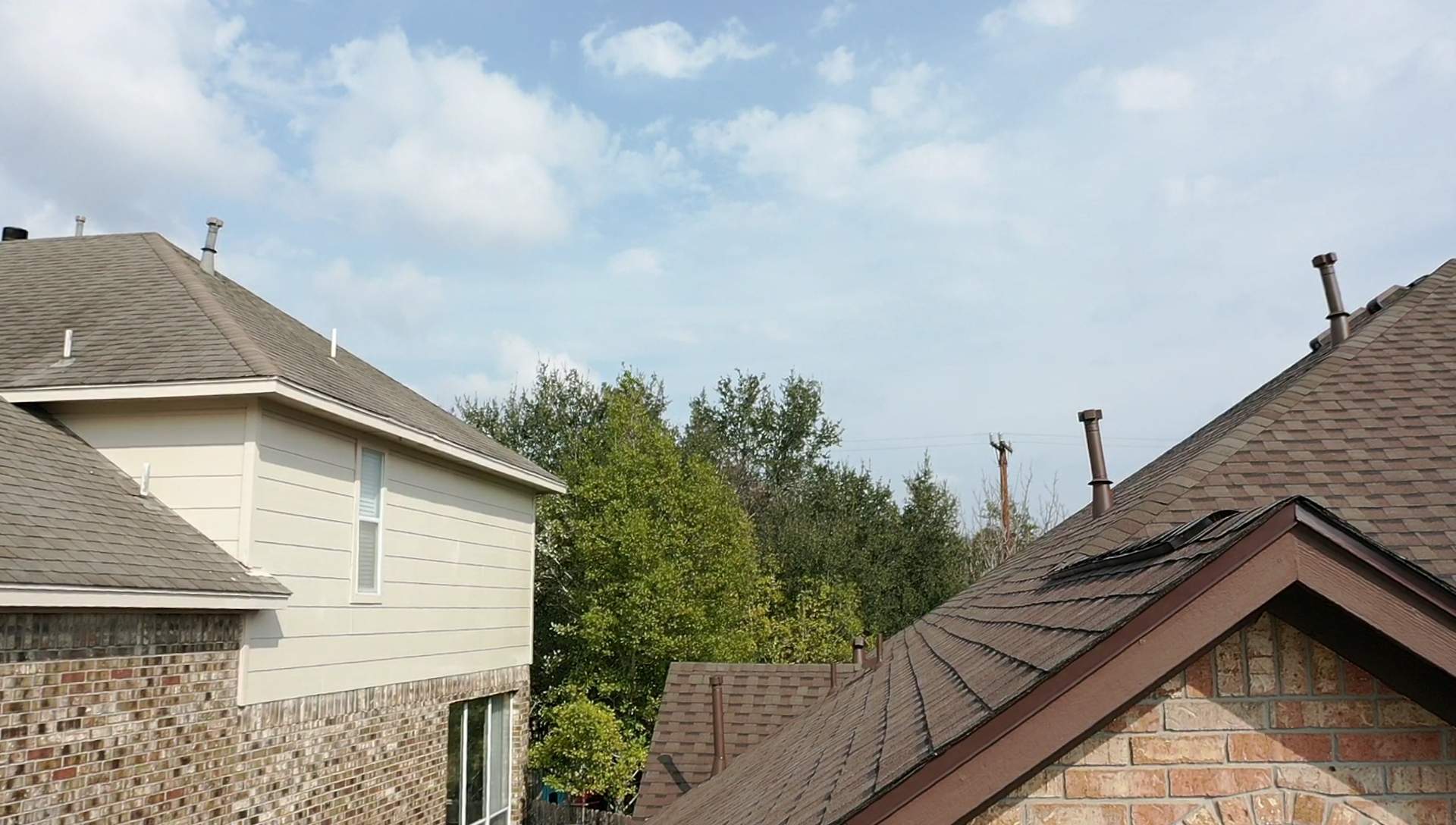 Residential Roof Replacement using Pinnacle Pristine 30 Year Laminate Shingles by Premier Roofing and Contracting